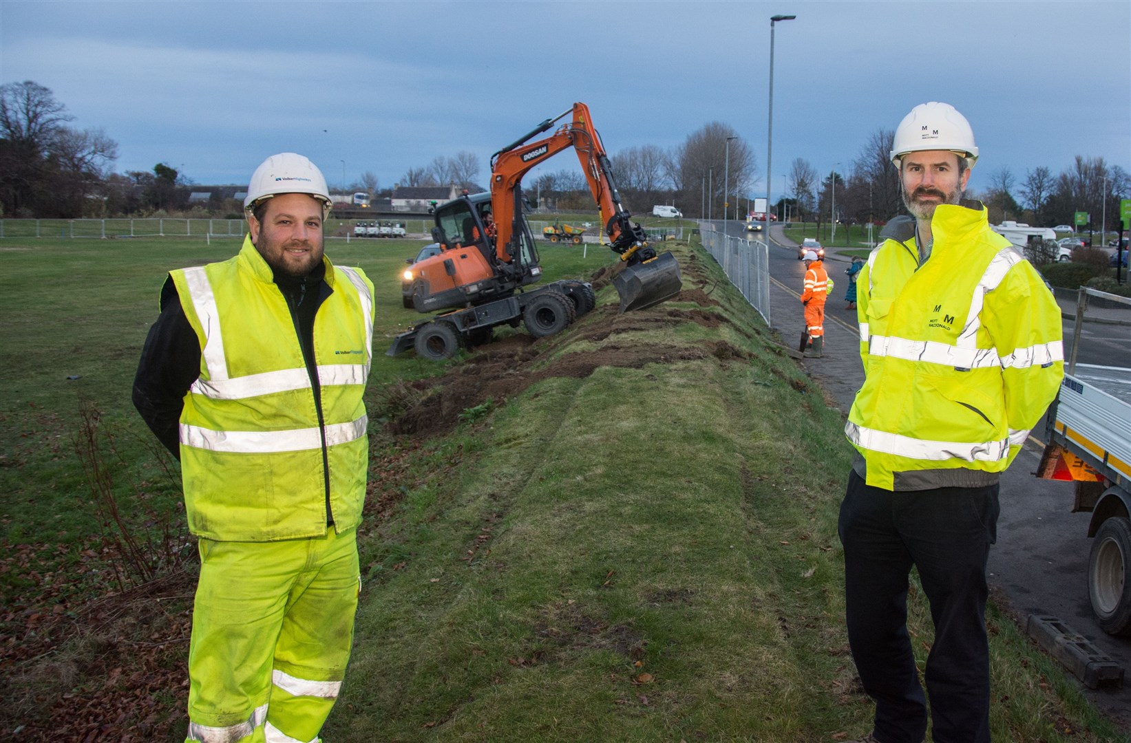 Simon Nesbitt, a trustee at Elgin Sports Community Trust (R) with sub agent Callum Higgins. Building work for the new sports complex at Lesser Borough Briggs is now under way. Picture: Becky Saunderson