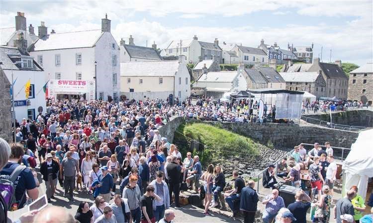 Throngs of people at Portsoy's Scottish Traditional Boat Festival in summer 2019.