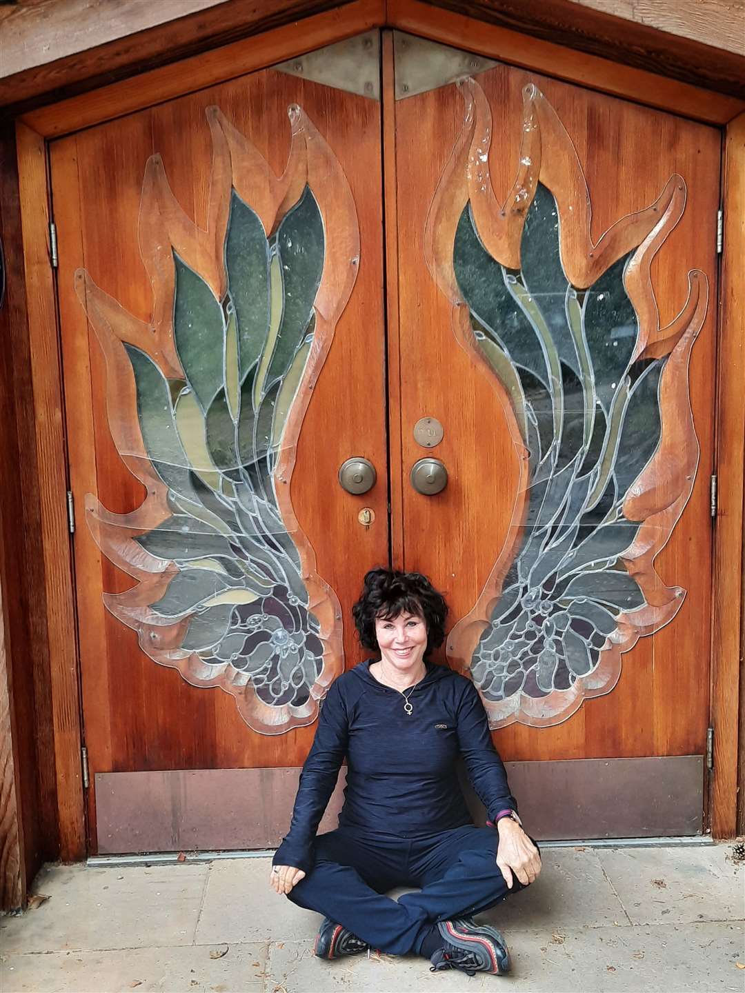 Comedian Ruby Wax at the angel doors of the Findhorn Foundation's Universal Hall. Picture: Britta Schmitz.