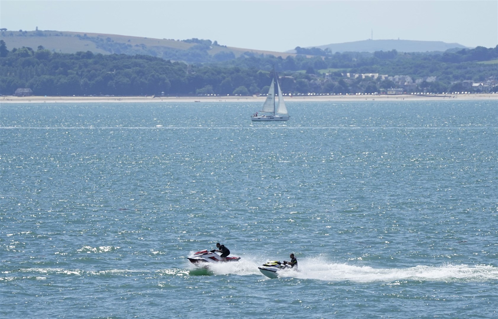 People jet ski in the Solent near Southsea in Hampshire (Andrew Matthews/PA)