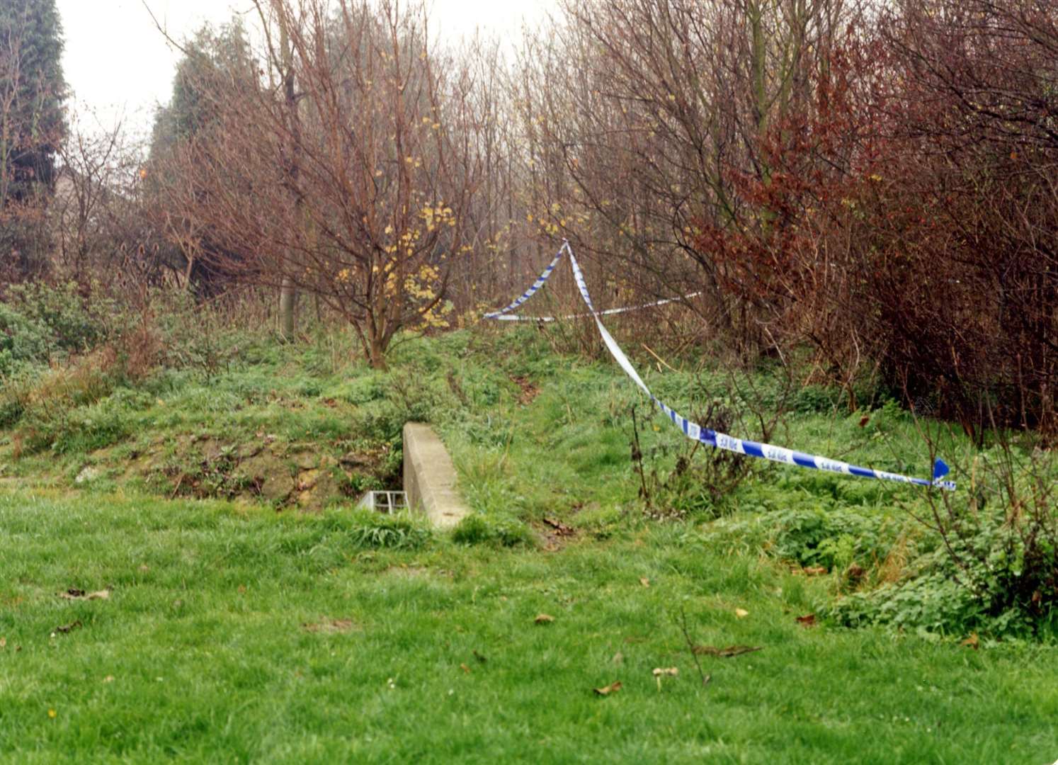 Police tape cordoning off the woods next to the Welland Estate in Peterborough, near to where Rikki Neave’s body was found (Cambs Police/PA)