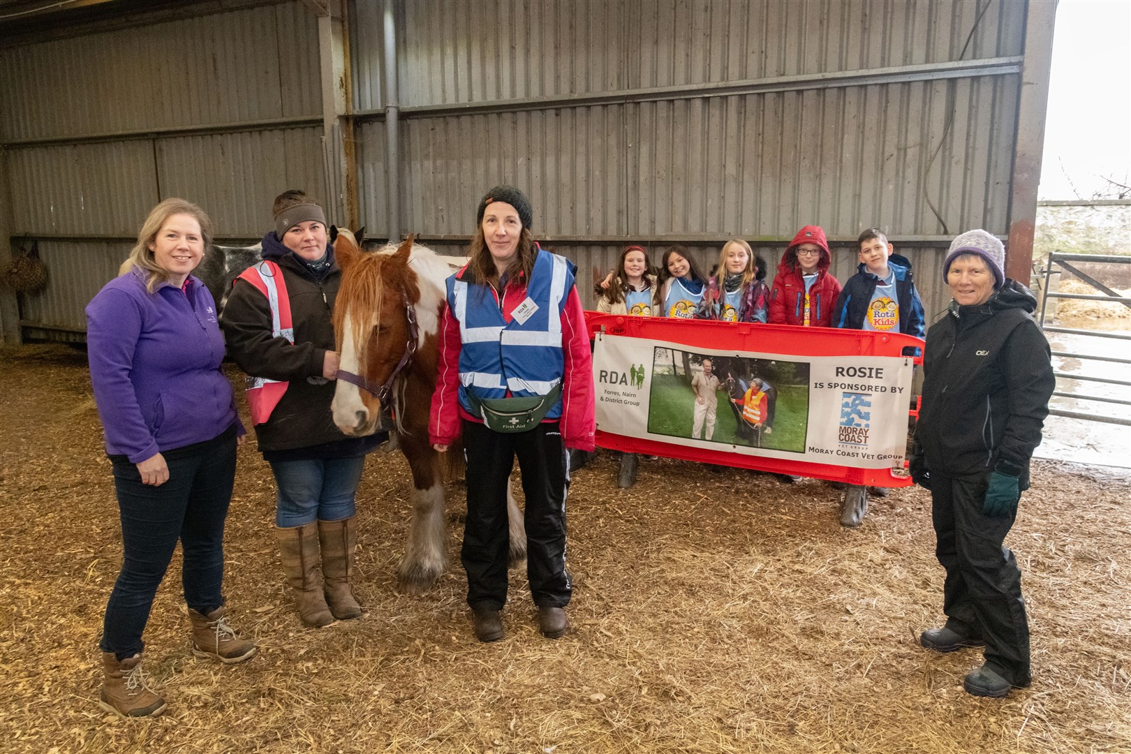 From left: Sarah Rollo (Gordon And Ena Baxter Foundation); Michelle Lucas (RDA); Lucy the pony; Emma Gregg (RDA), Mosstowie Primary School pupils and Elizabeth Furness (RDA regional chair). Picture: Beth Taylor.