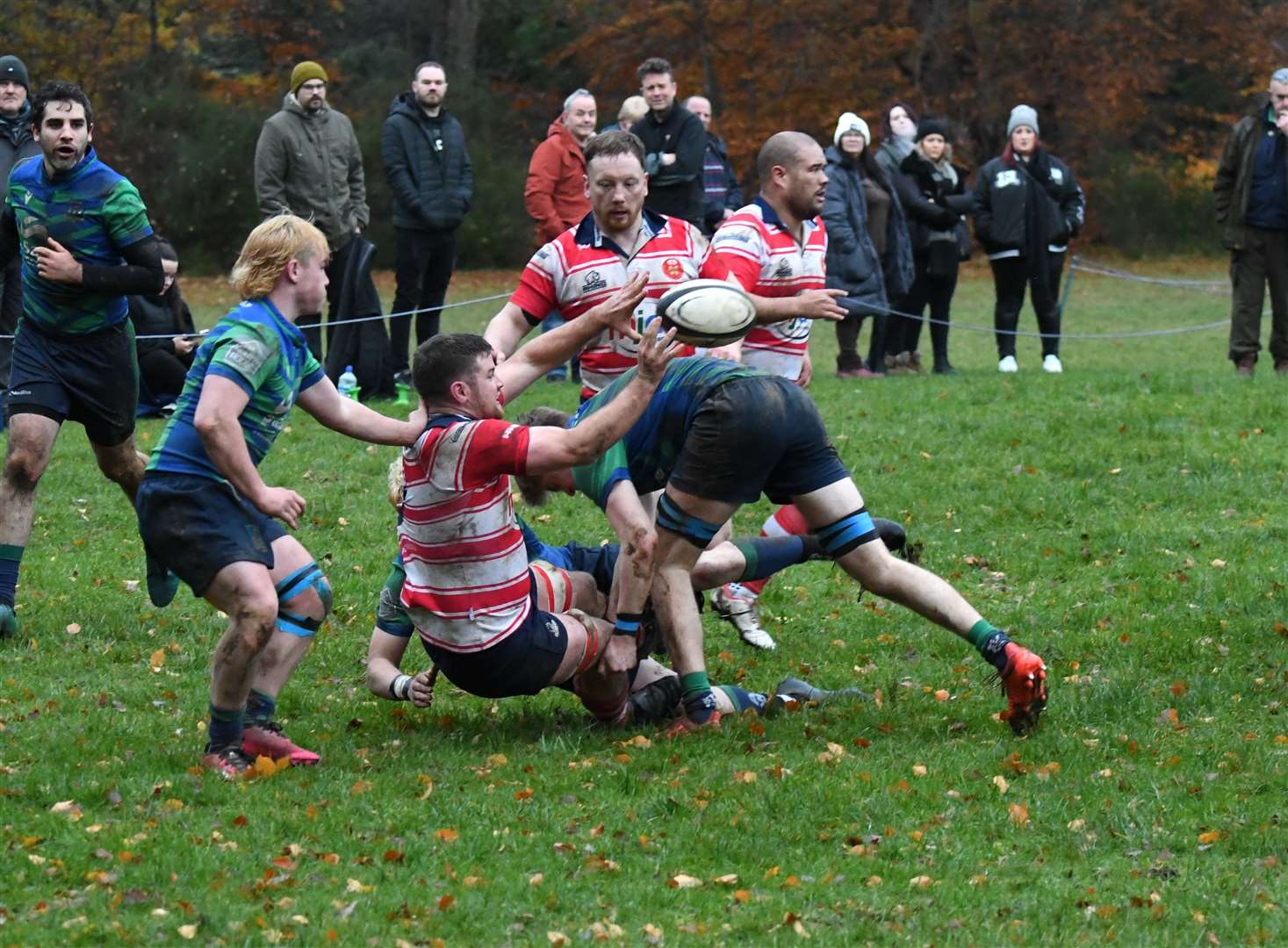 Neil Alexander keeps ball alive in tackle. Kris Morrison in support. Picture James Officer