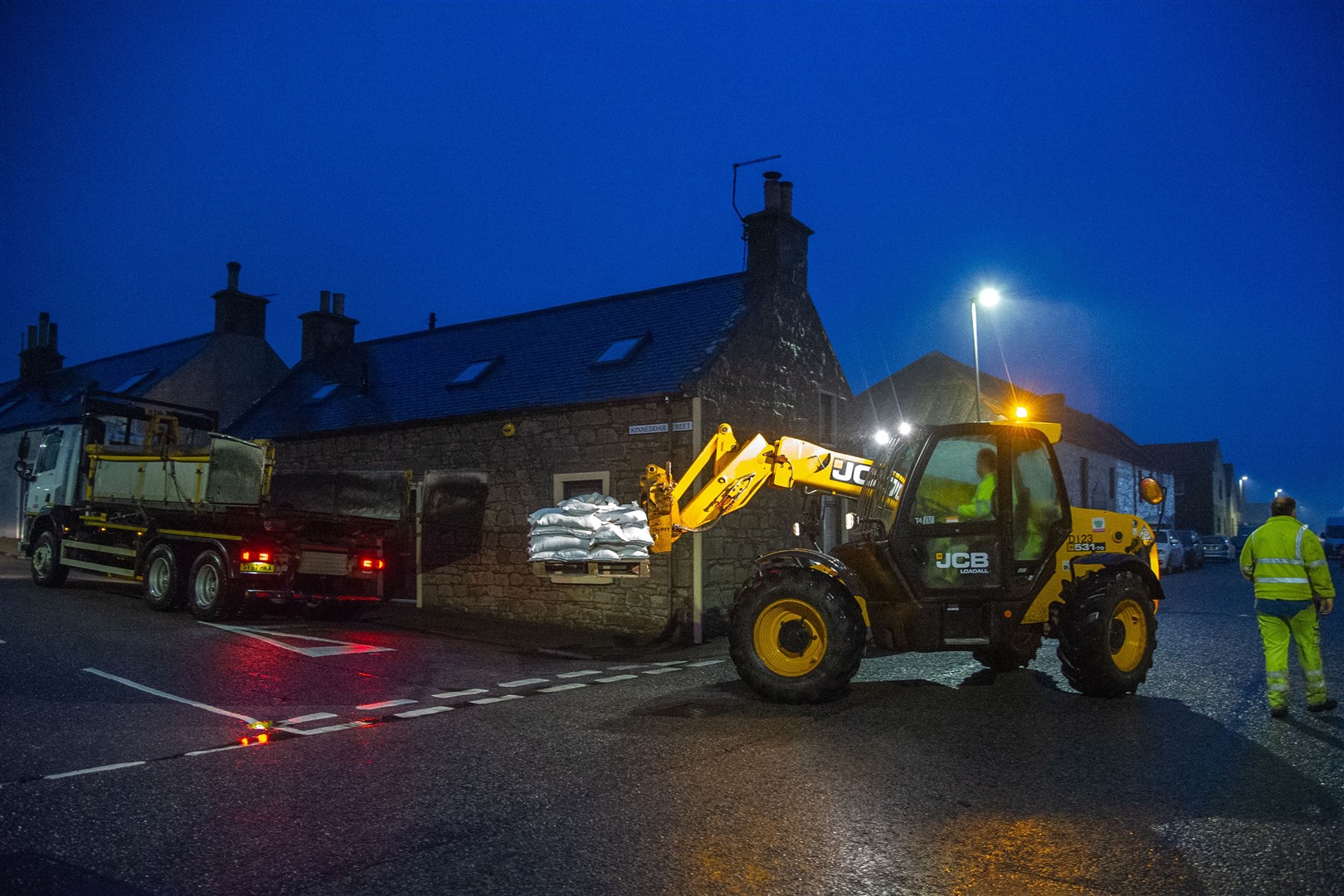 The Moray Council have started handing out pallets of sandbags around the coastal streets of Lossiemouth after a flood warning was declared for the Moray town. ..Picture: Daniel Forsyth..