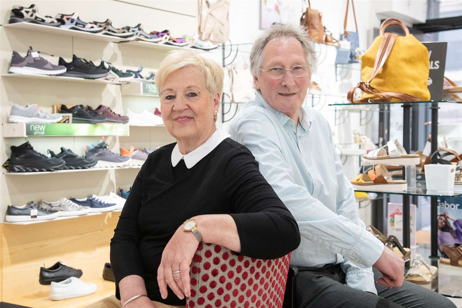 Alan Reid and Annita Brown...Long-serving members of staff are rewarded for their service at Elgin shop Begg's Shoes and Bags...Picture: Daniel Forsyth..