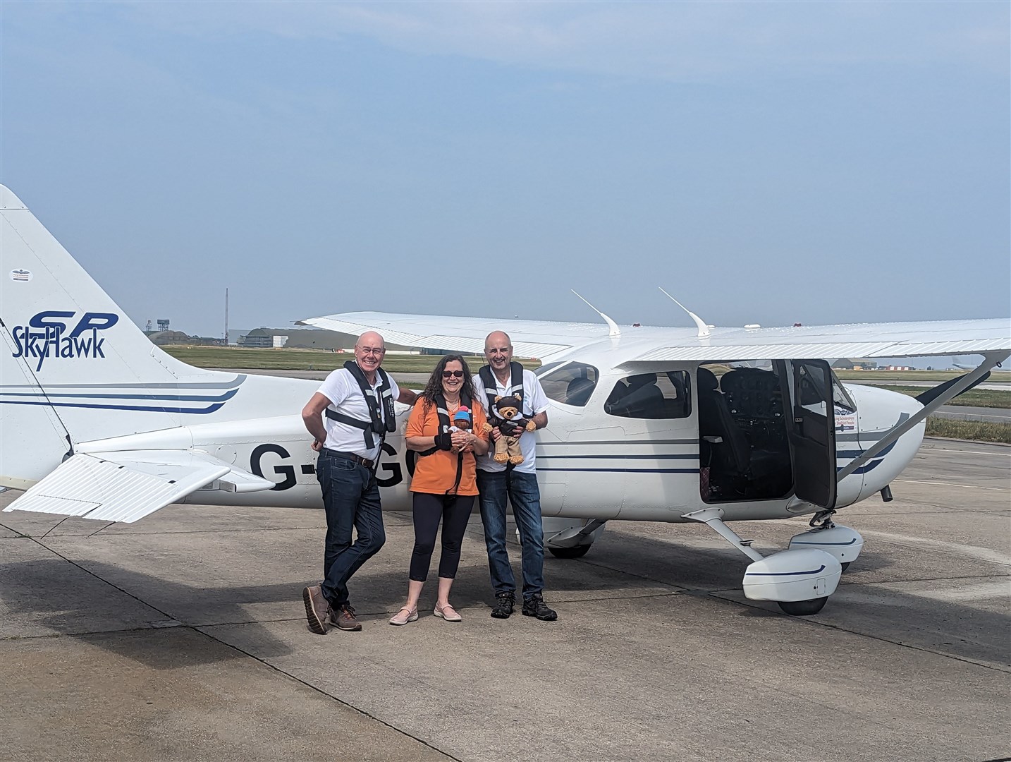 Karen with Ian plus pilot John Mott.