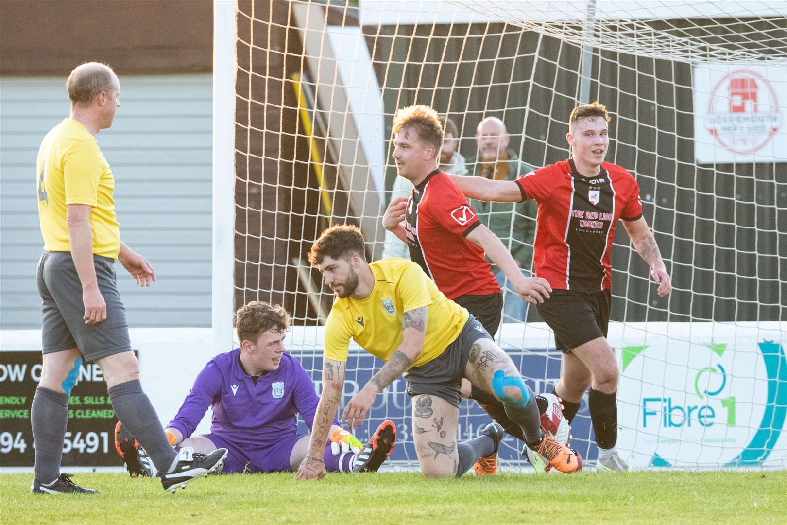 Fochabers forward Warren Orford (centre) opens the scoring. ..Fochabers FC (7) vs Hopeman FC (2) - Mike Simpson Cup Final 2023 - Grant Park, Lossiemouth...Picture: Daniel Forsyth..