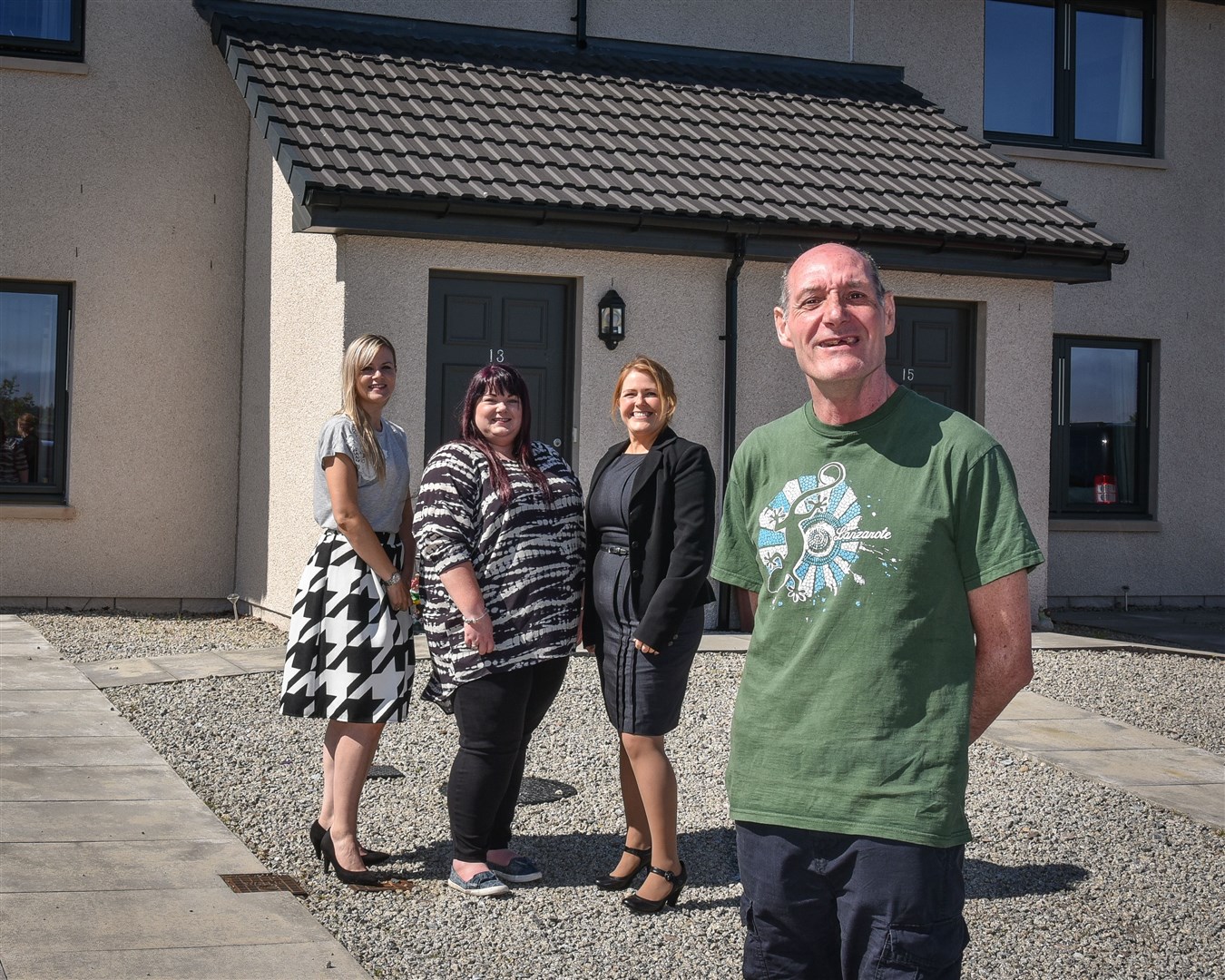 Tenant Philip Gillies with (from left) Aimee Borzoni, commissioning officer for Health and Social Care Moray; Emma Horne, service leader for Community Integrated Care and Stacy Angus, Osprey Housing’s services manager.