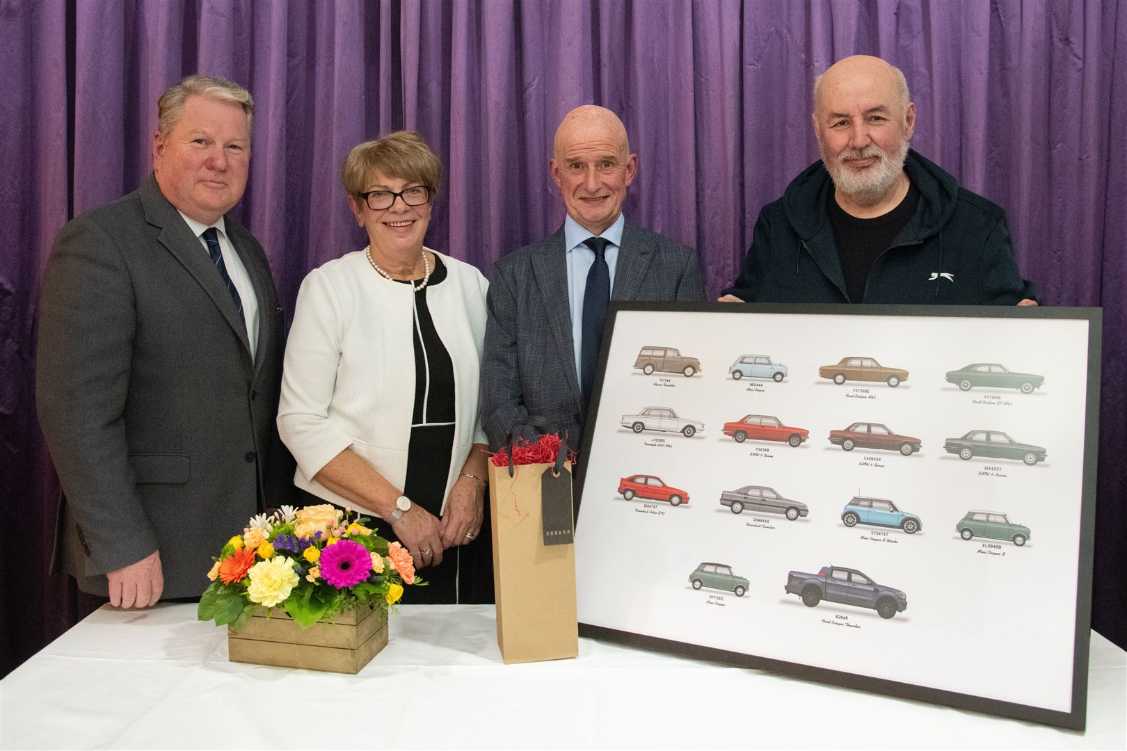 From left; Ian Palmer (Chief Executive - White & Company), Fiona Murphy (retiring after 28 years), David Christie (Forres branc manager) and Norman Ralph (retiring after 40 years)...Double retirement from White's and Company in Forres...Picture: Daniel Forsyth..