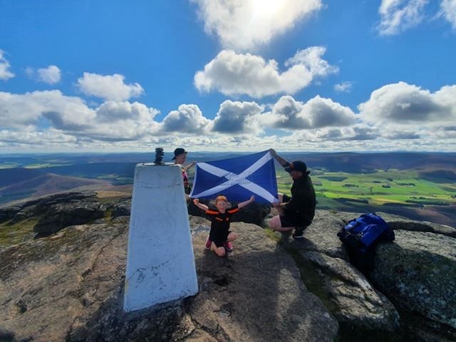 Evelyn Mitchell made it to the top of Ben Rinnes to support Weir Black Belt Academy.