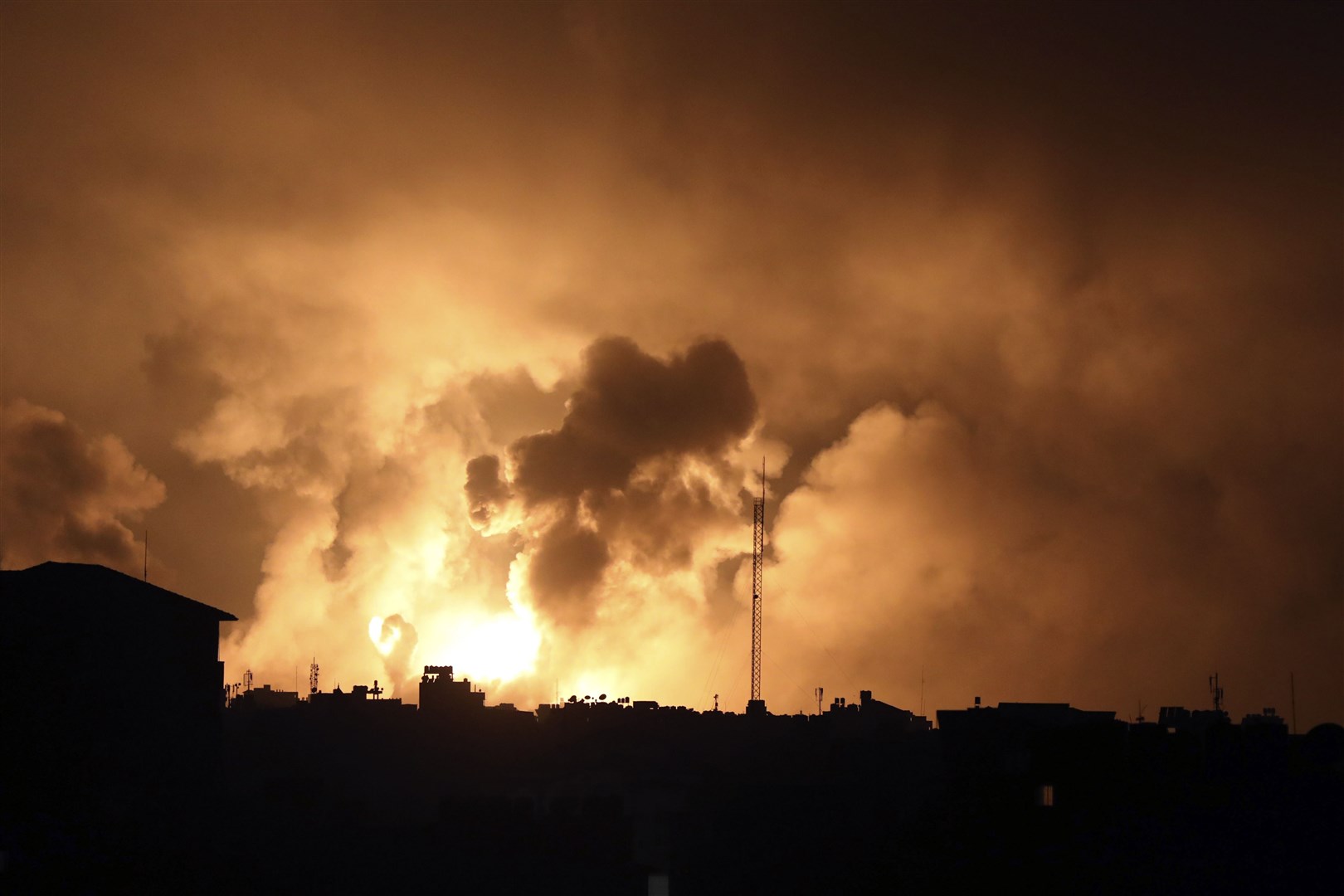 Explosions caused by Israeli airstrikes in the northern Gaza Strip on Friday (Abed Khaled/AP)