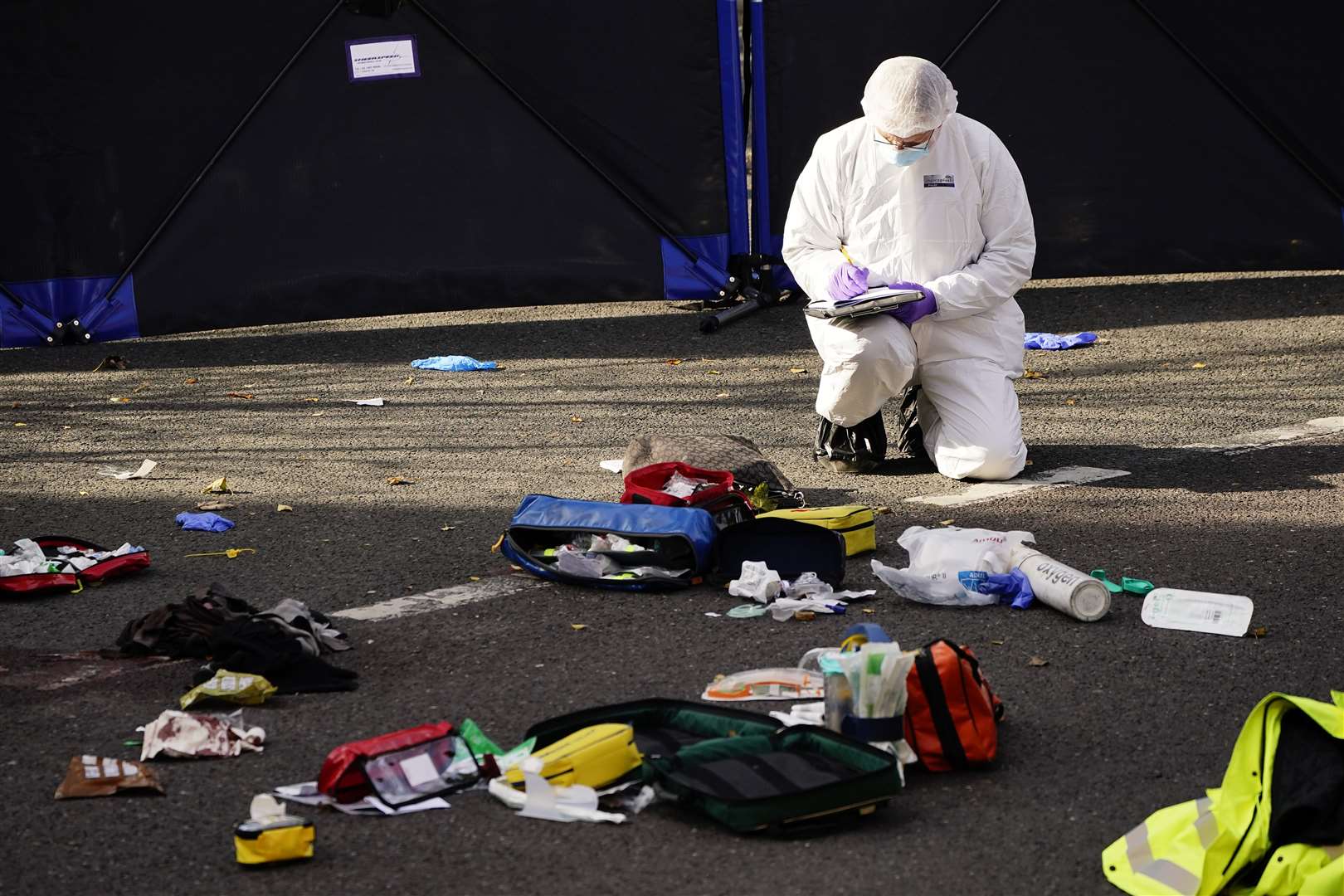 A forensic officer at the scene (Aaron Chown/PA)