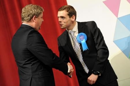 Conservative candidate Douglas Ross (right) congratulates Angus Robertson.