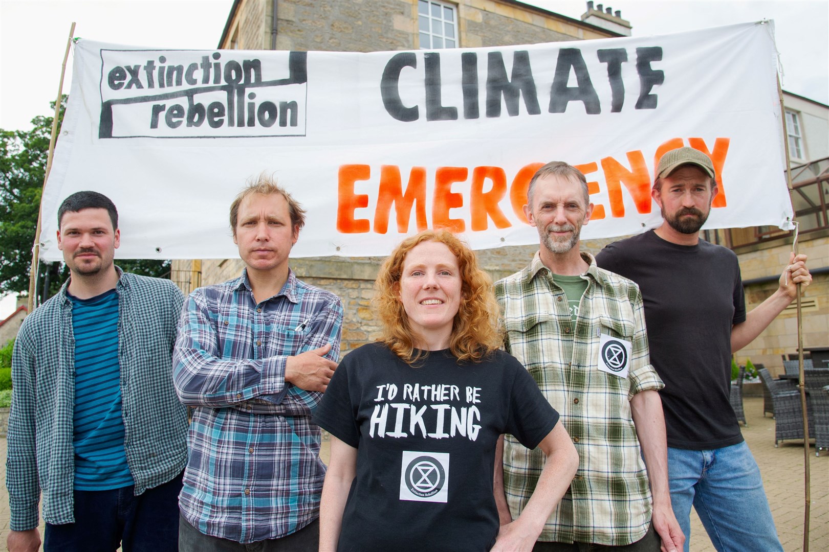 Protesters outside the Mansfield Hotel in Elgin. L-R: Laurence (no surname given), Patrick Cooper, Susannah Peel, Simon MacLardie and Andrew Heath.