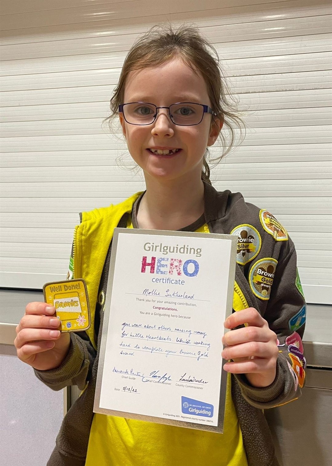 Mollie Sutherland, 2nd New Elgin Brownies, with her award.
