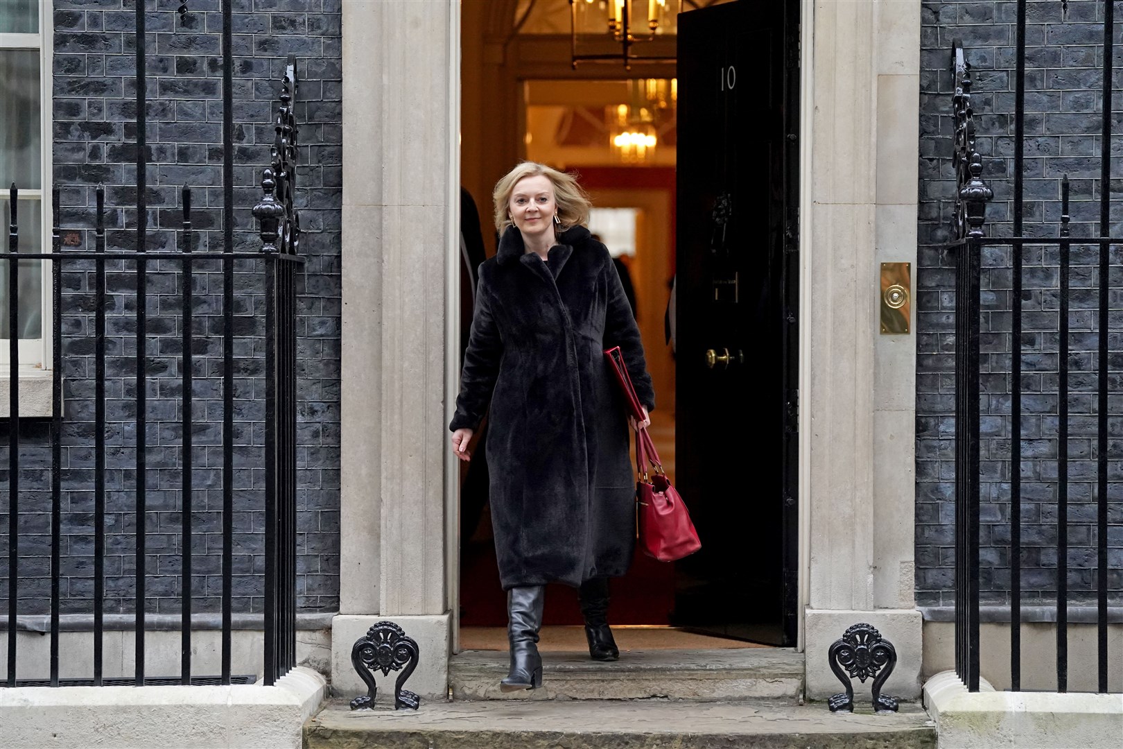 Liz Truss leaving 10 Downing Street after a Cabinet meeting in January (Stefan Rousseau/PA)
