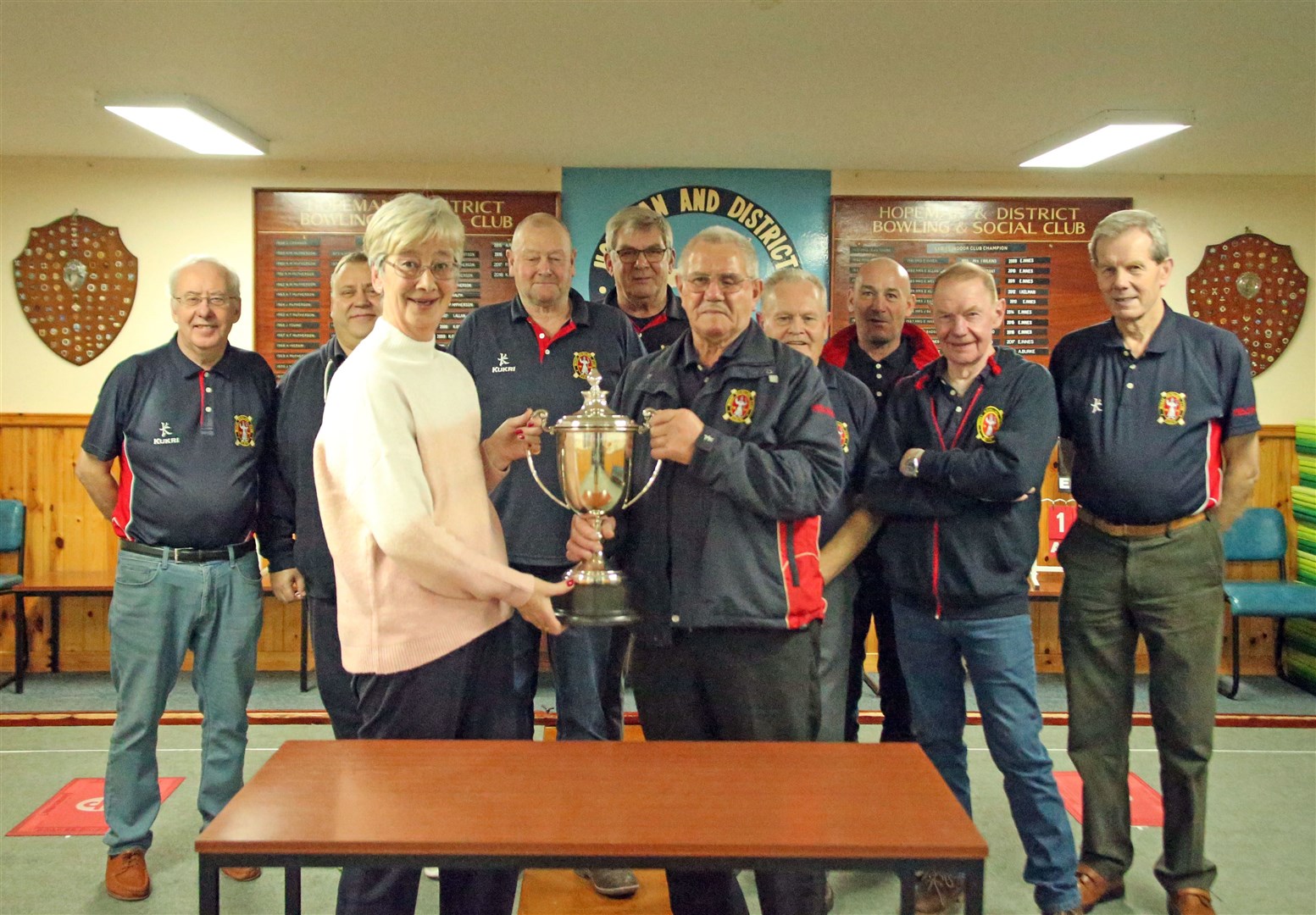 The winning Moray Bowling Club squad with their trophy. Photo: Peter Bloomfield.