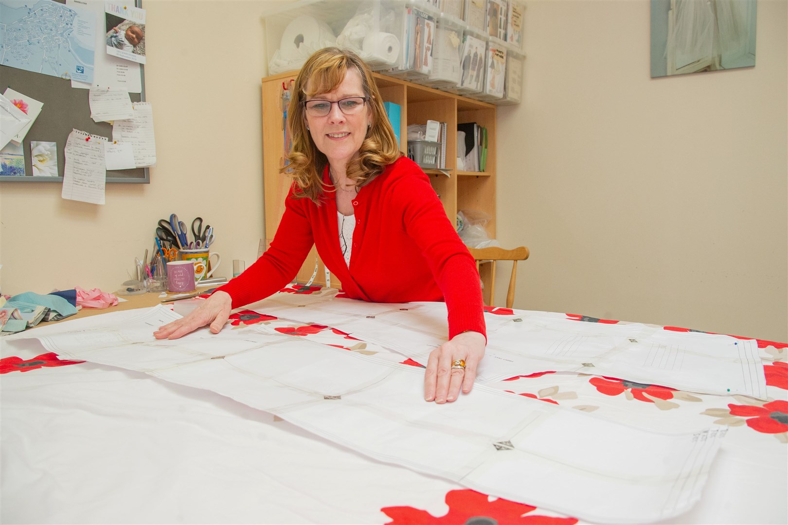 Maureen Halkett, owner of Unique Ladieswear in Lossiemouth, is co-leading a hardworking volunteer team as part of Moray Scrubs' co-ordinated effort. Picture: Daniel Forsyth.