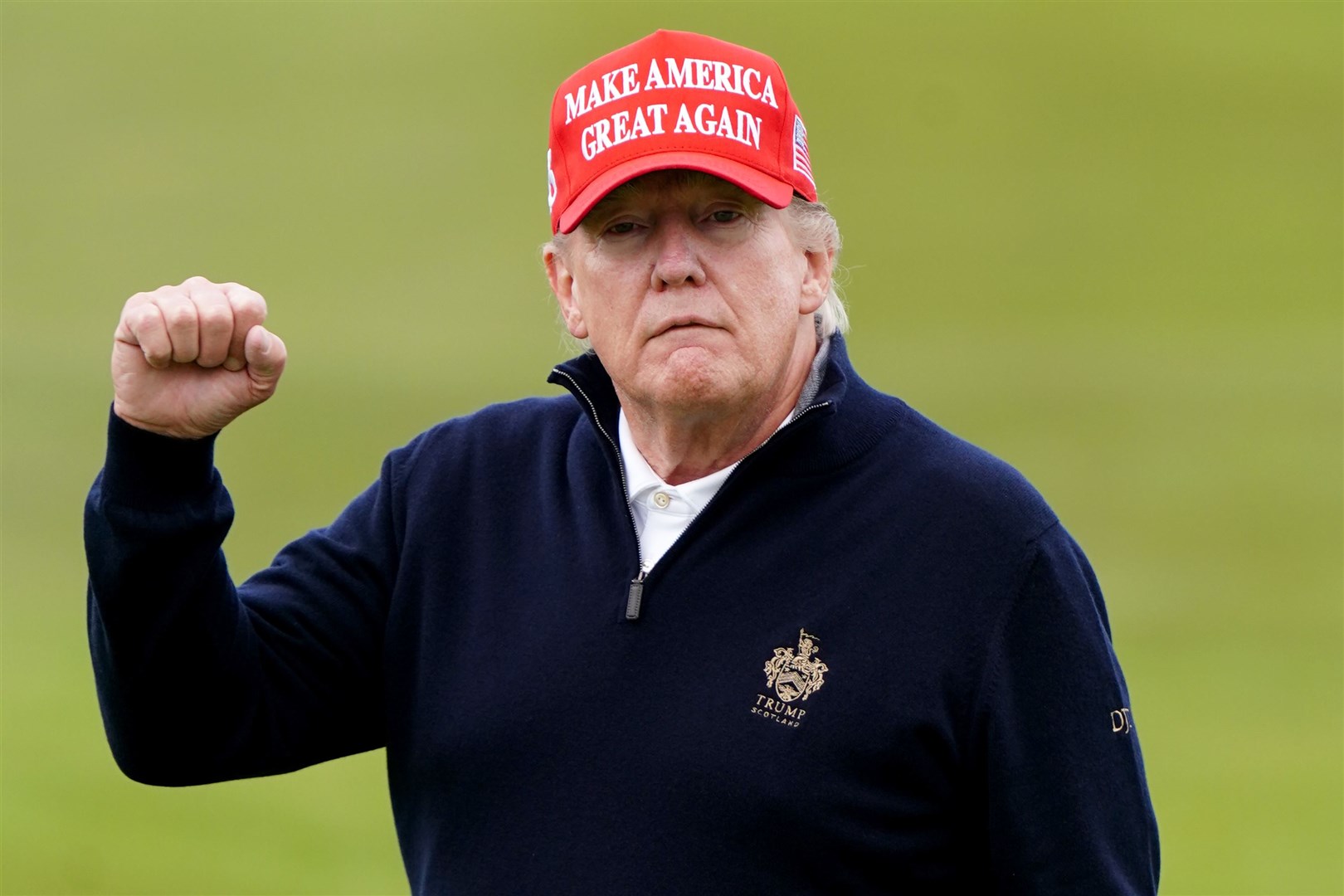 Former US president Donald Trump playing golf at Turnberry golf course during a visit to the UK (Jane Barlow/PA)