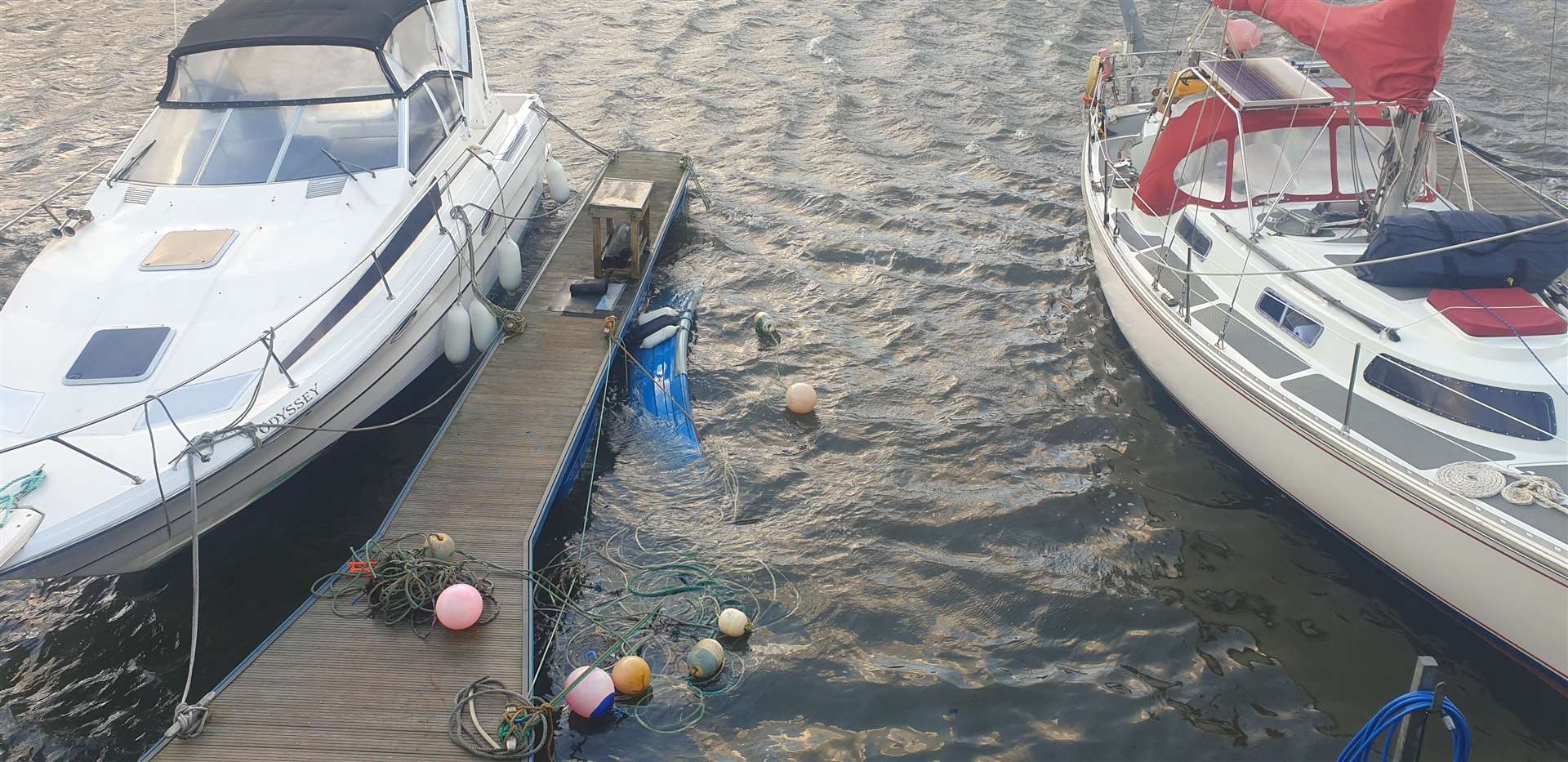 A small boat had sunk in the marina at Lossiemouth Harbour.