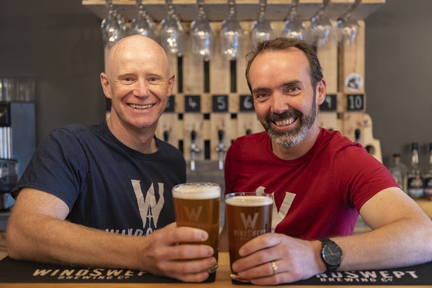 Al Read and Nigel Tiddy, owners of Windswept Brewing Co, drink to their success.