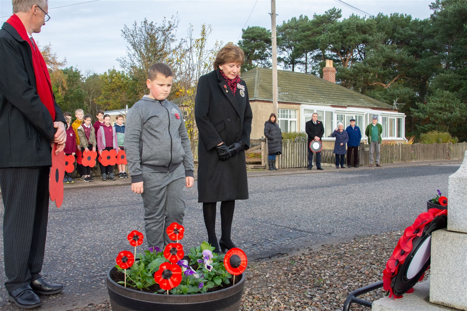 Margaret Stenton lays a wreath on behalf of the Lord Lieutenant of Moray.