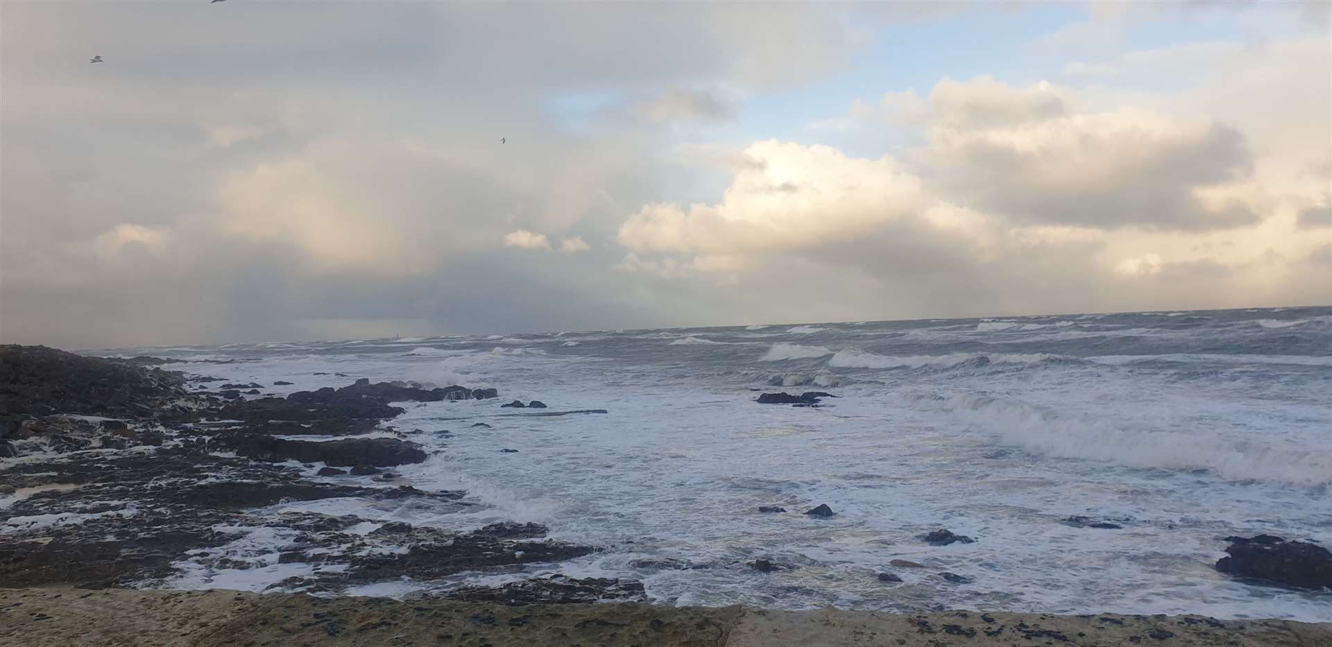 Calmer on Saturday morning but the stormy sea still whipped up by Storm Arwen.