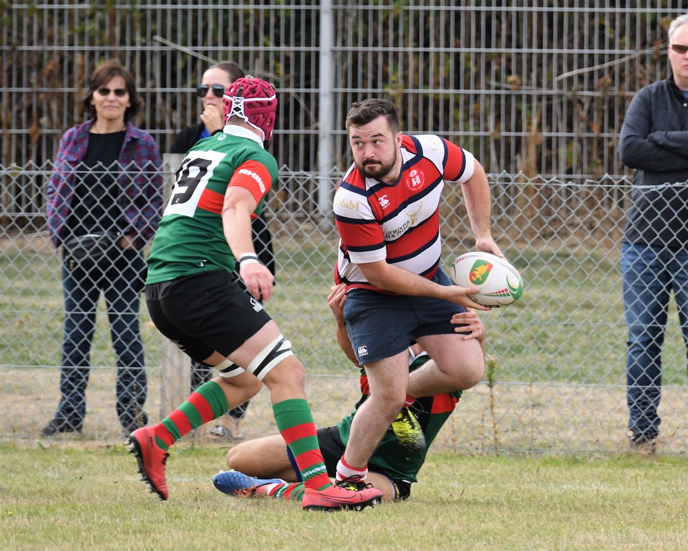 Ed Walling tries to offload in the tackle. Picture: James Officer