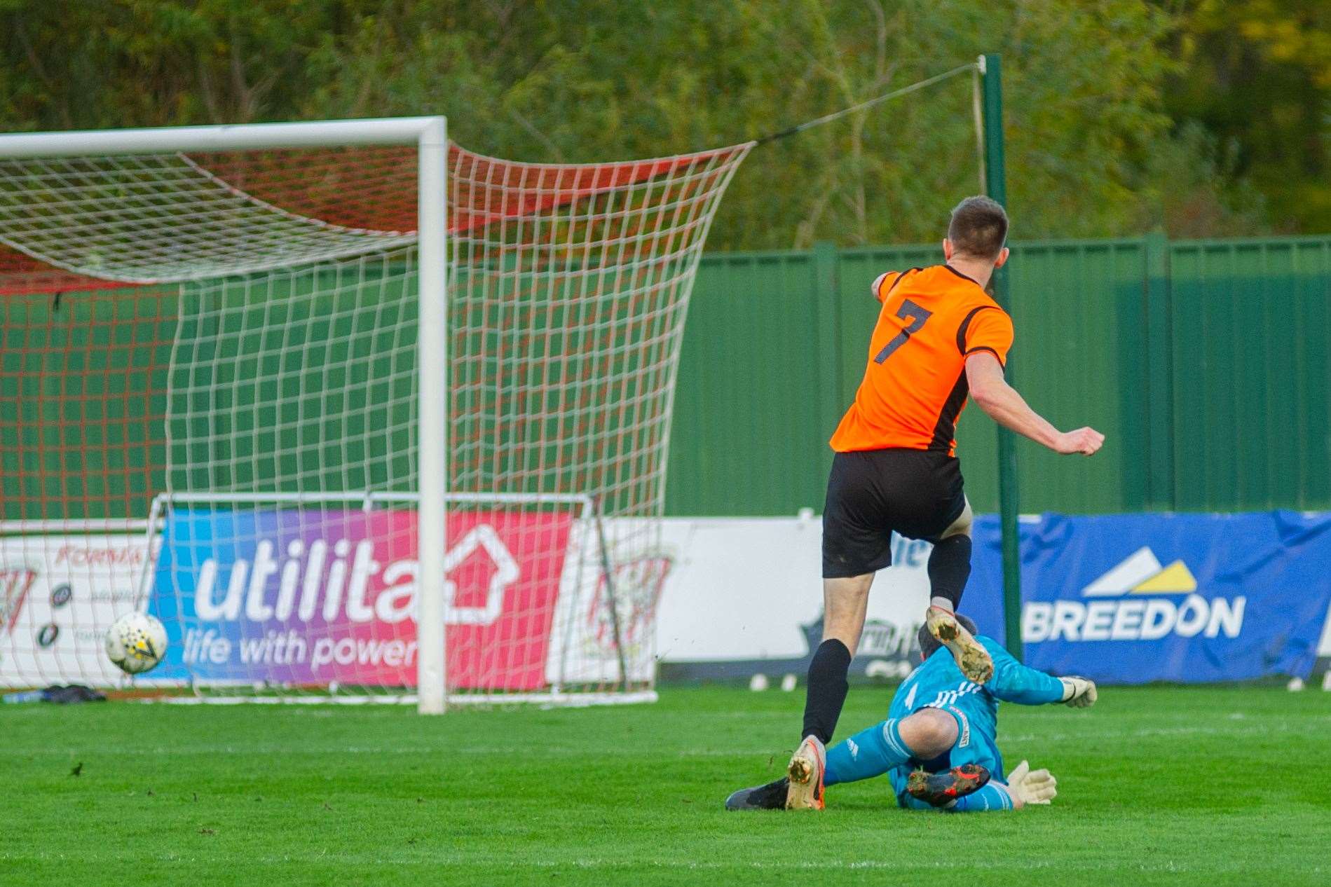 Craig Cormack scores the Rothes winner past Formartine keepr Kevin Main...Picture: Daniel Forsyth..