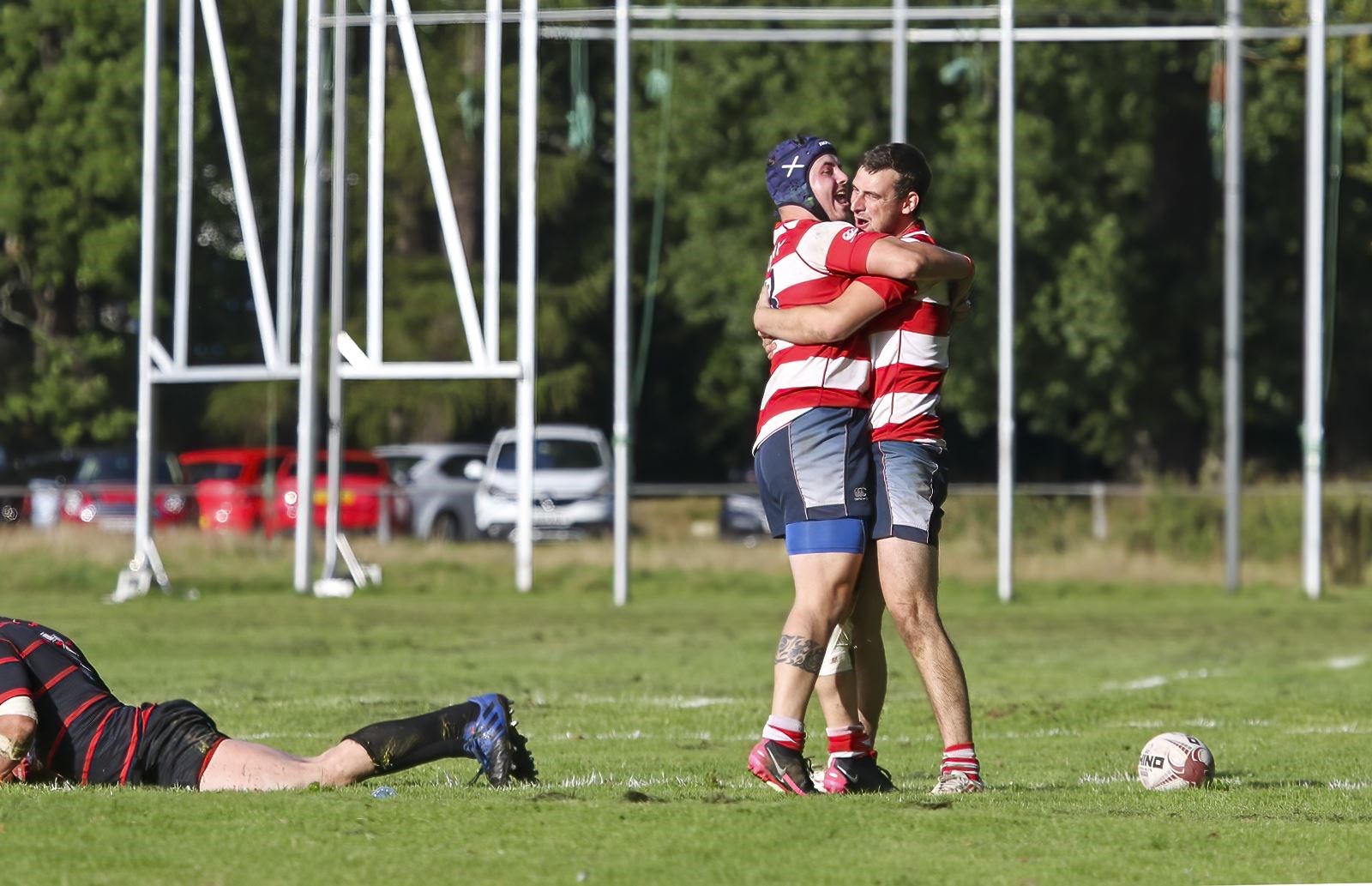 An embrace between Connor McWilliam and Archie Duncan after Duncan scored his try. Photo: John MacGregor