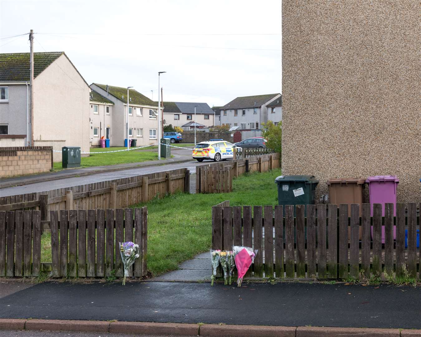 Floral tributes outside the property in Elgin. Picture: Jasperimage