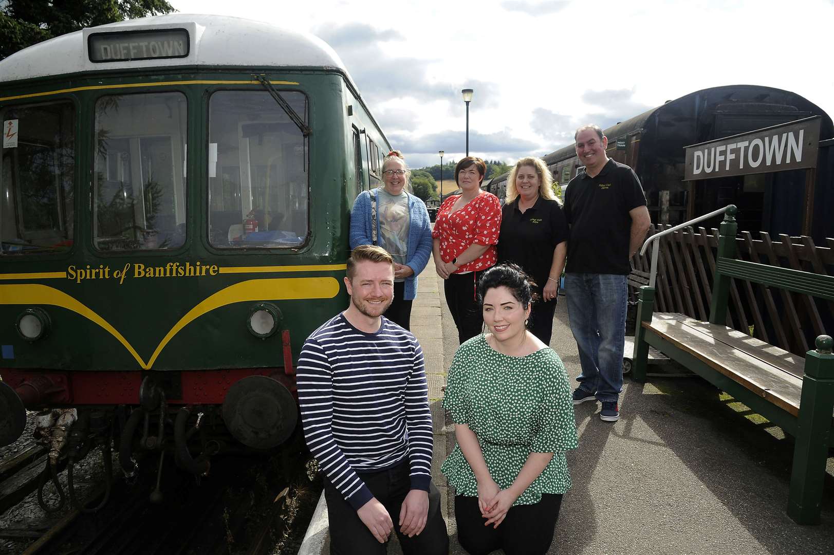 Siblings Andrew and Laura Wrigley (front) with (back from left) Janice King of the Keith and Dufftown Railway, Dufftown Royal British Legion secretary Claire Porter, and Sidings Café owners Anya Hoffman and Darren Spence. Picture: Becky Saunderson.