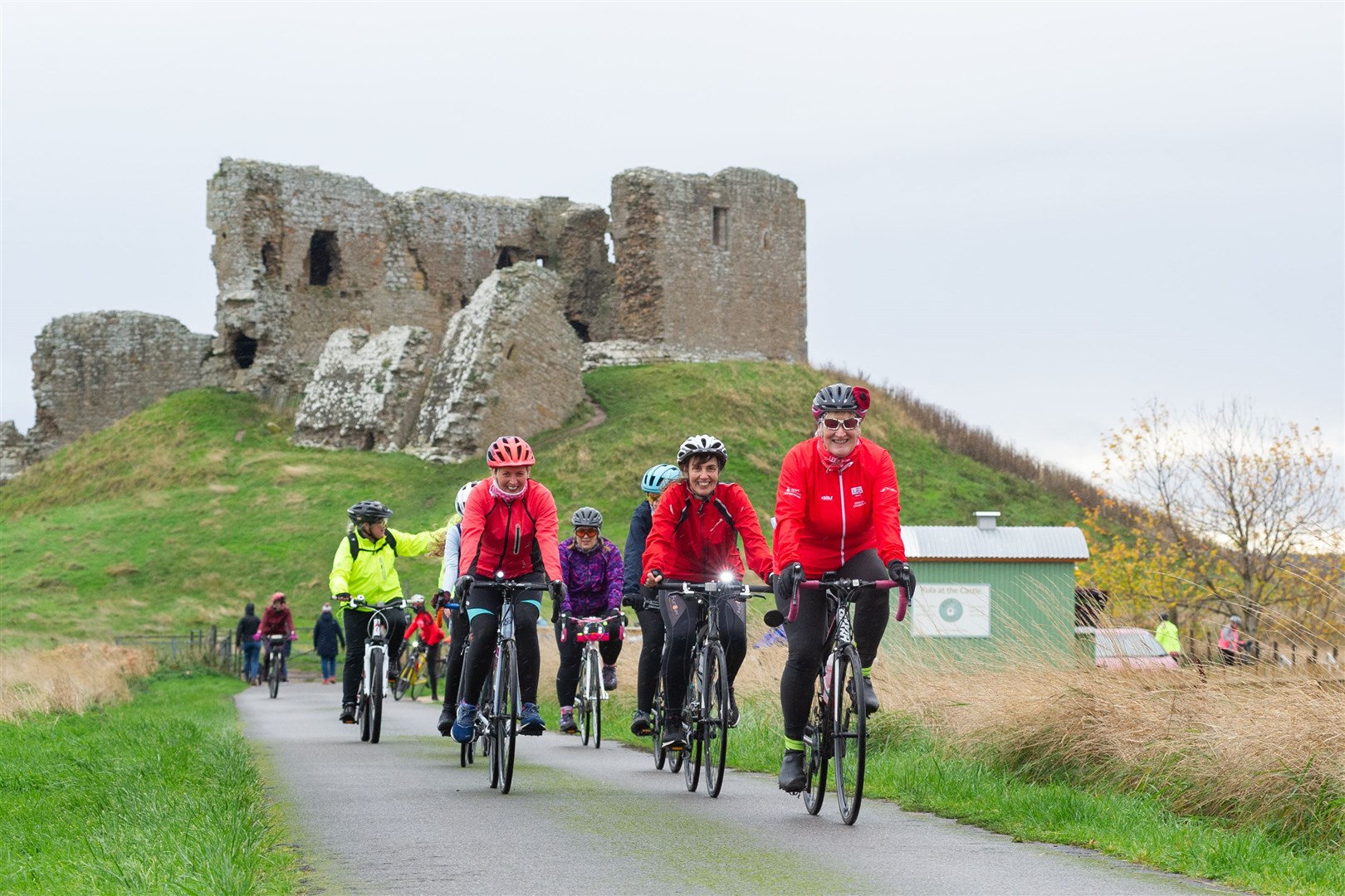 After a quick break, the cyclists leave Duffus Castle. ..A record number of cyclists from the of the Nairn and Elgin Breeze Groups turn out for a cycle from Elgin Library to Duffus Castle and back. ..Picture: Daniel Forsyth..
