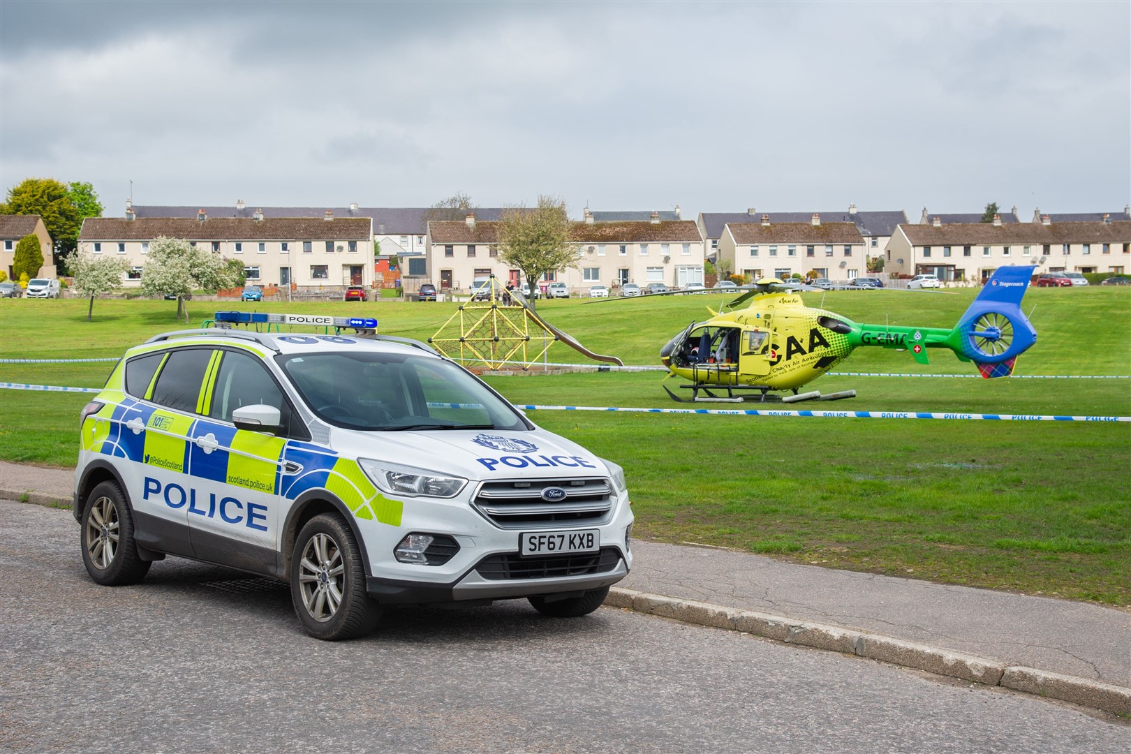 Emergency services and the Scotland's Charity Air Ambulance attend in incident in Bishopmill. The Air Ambulance landed on the grass in off of Brodie Drive in Bishopmill, Elgin...Picture: Daniel Forsyth..