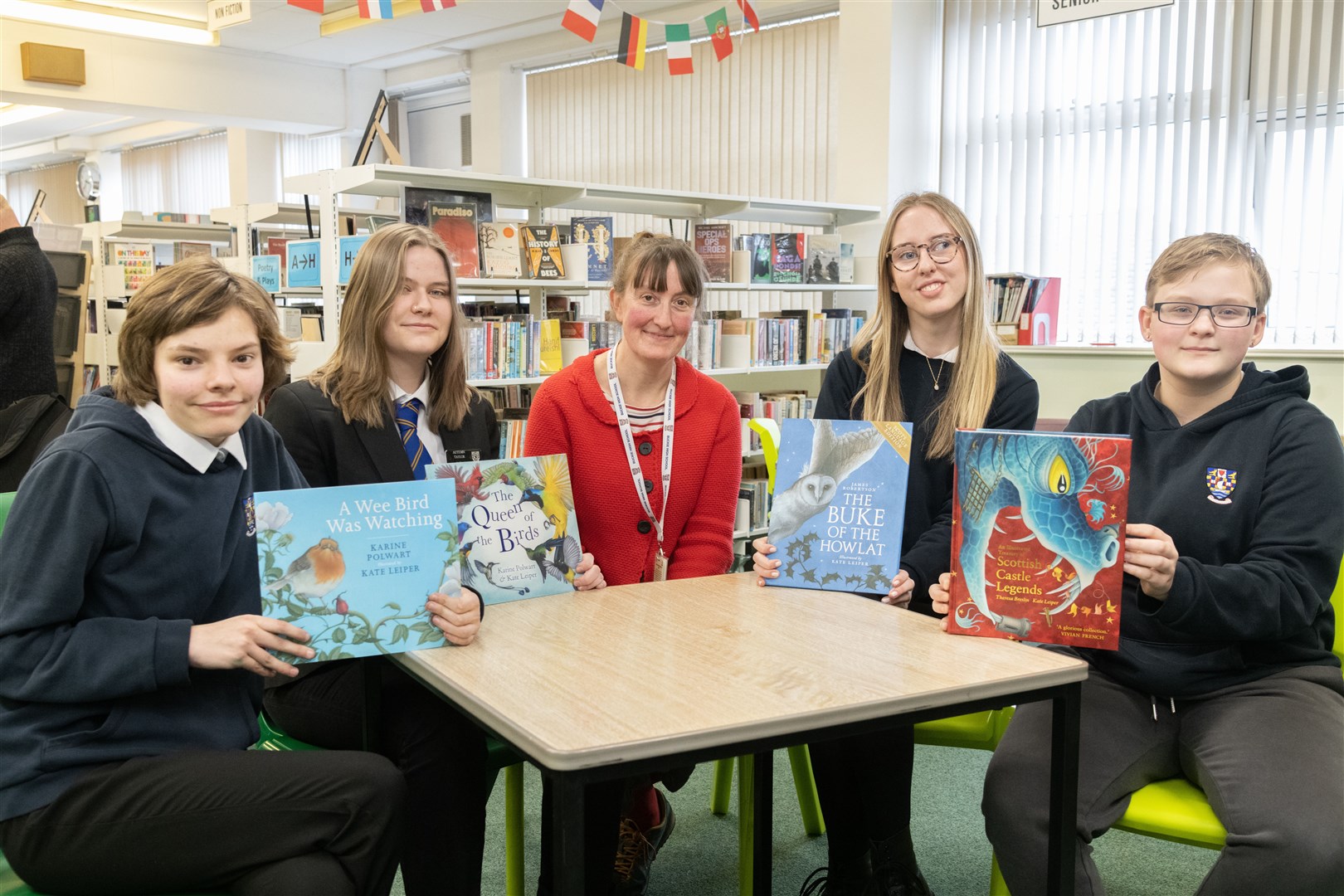 Offering Kate Leiper a warm Buckie High welcome on her first visit to the school are (from left) Isla Hutchison (S3), Autumn Taylor (senior), Poppy Reid (senior) and Levi Lawson (S3). Picture: Beth Taylor