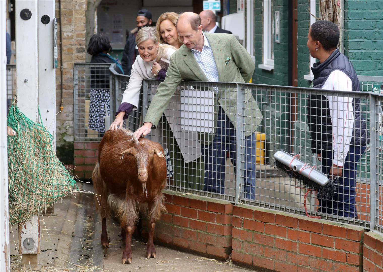 The couple stroked a goat during their visit (Chris Jackson/PA)