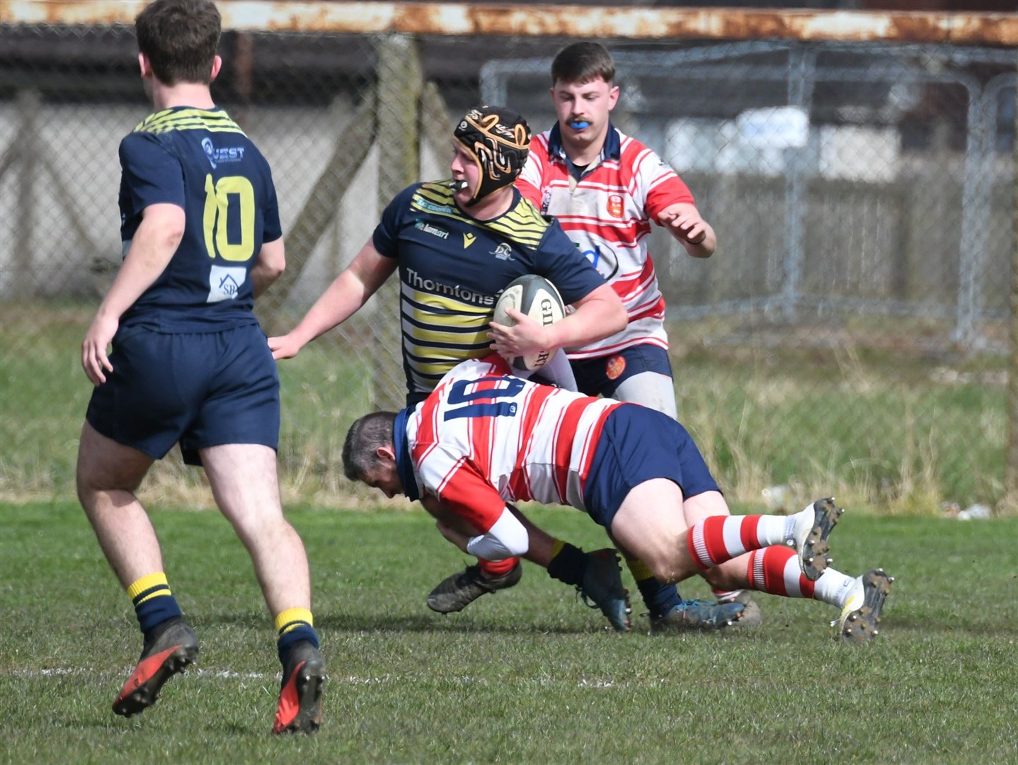 Douglas Ireland puts in a big hit with Connor McWilliam supporting. Picture: James Officer
