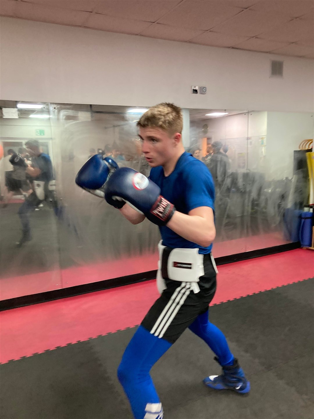 Elgin ABC fighter Corey Rizza has stepped up a category to take part in this weekend’s Scottish Championships.
