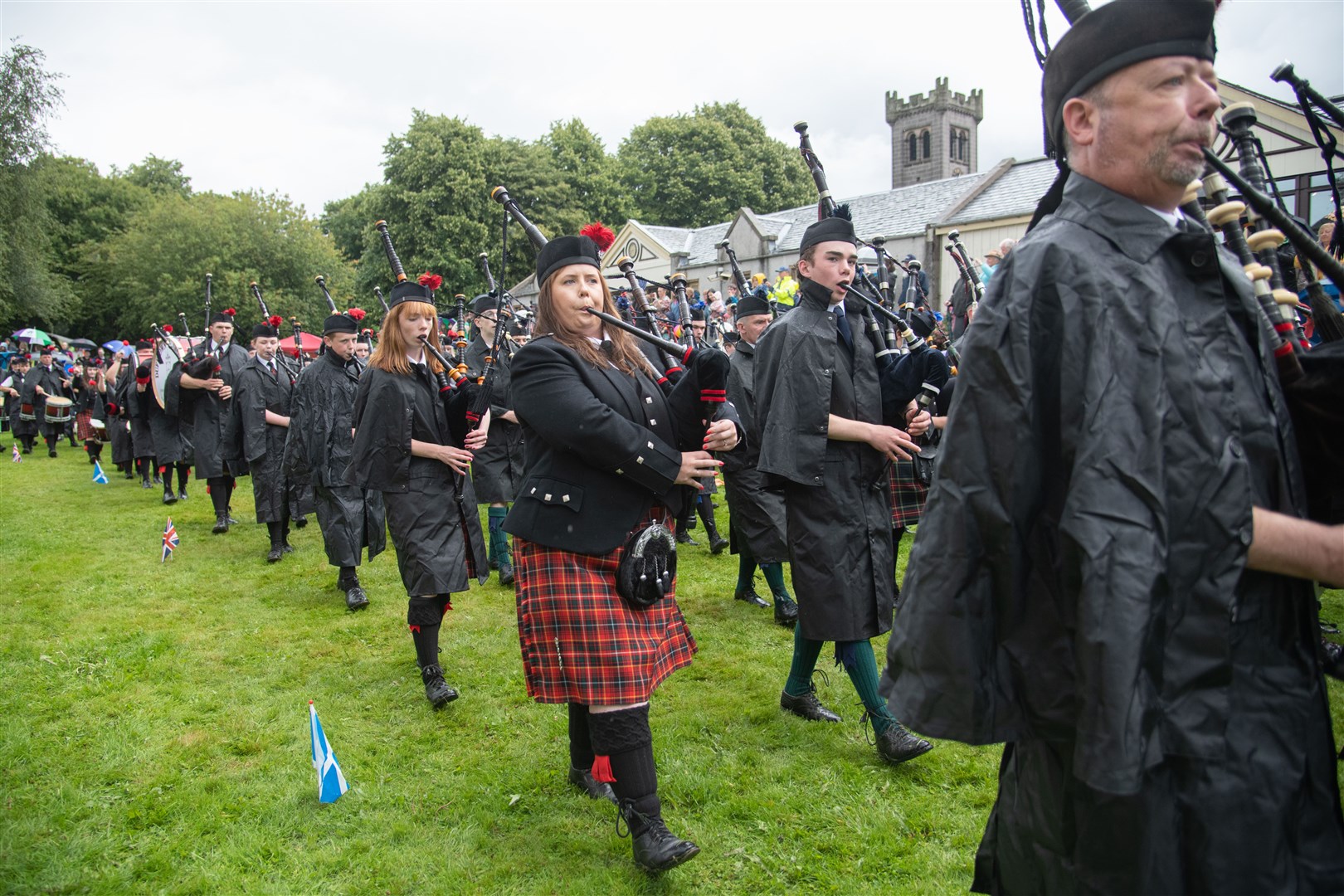 The massed pipe band parade around the games field...The 78th Aberlour Strathspey Highland Games, held at Alice Littler Memorial Park...Picture: Daniel Forsyth..