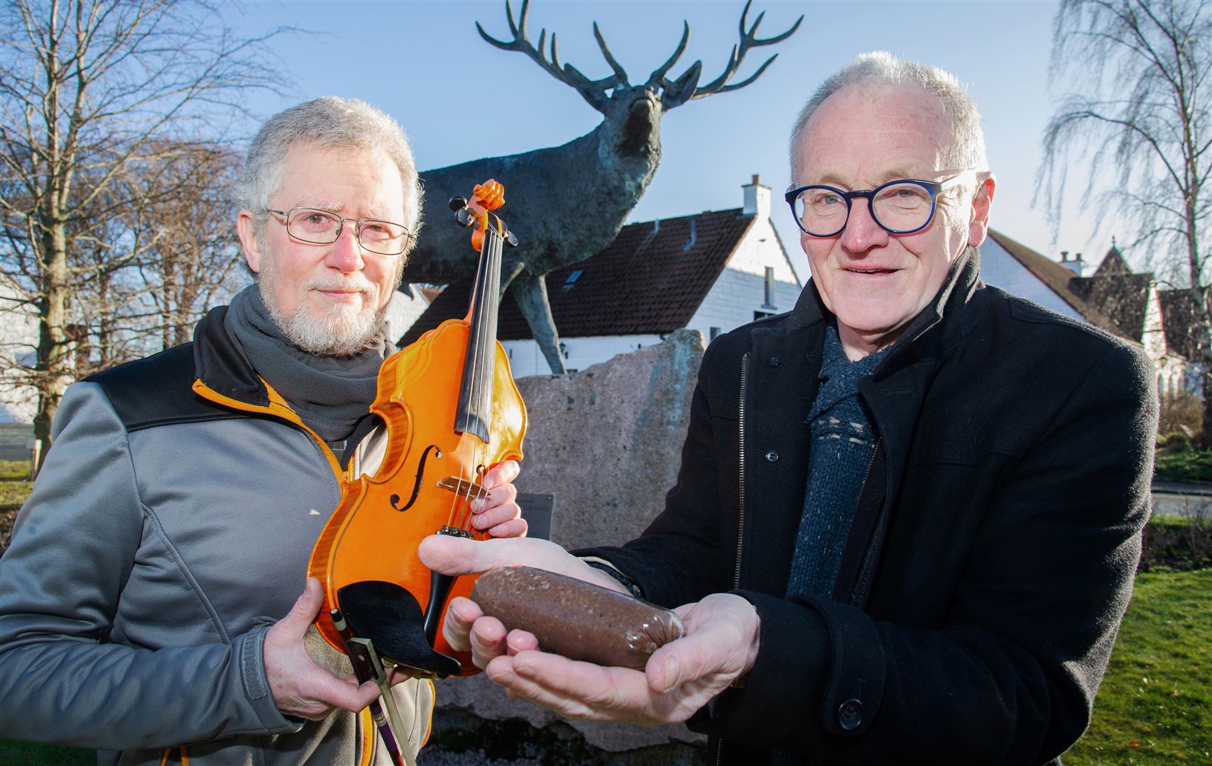 James Alexander (left) and Bob Sharp launch the first event of Speyfest's 25th anniversary year - a Burns Supper which is to be held at the Baxters Highland Village on Saturday, January 25. Picture: Daniel Forsyth.