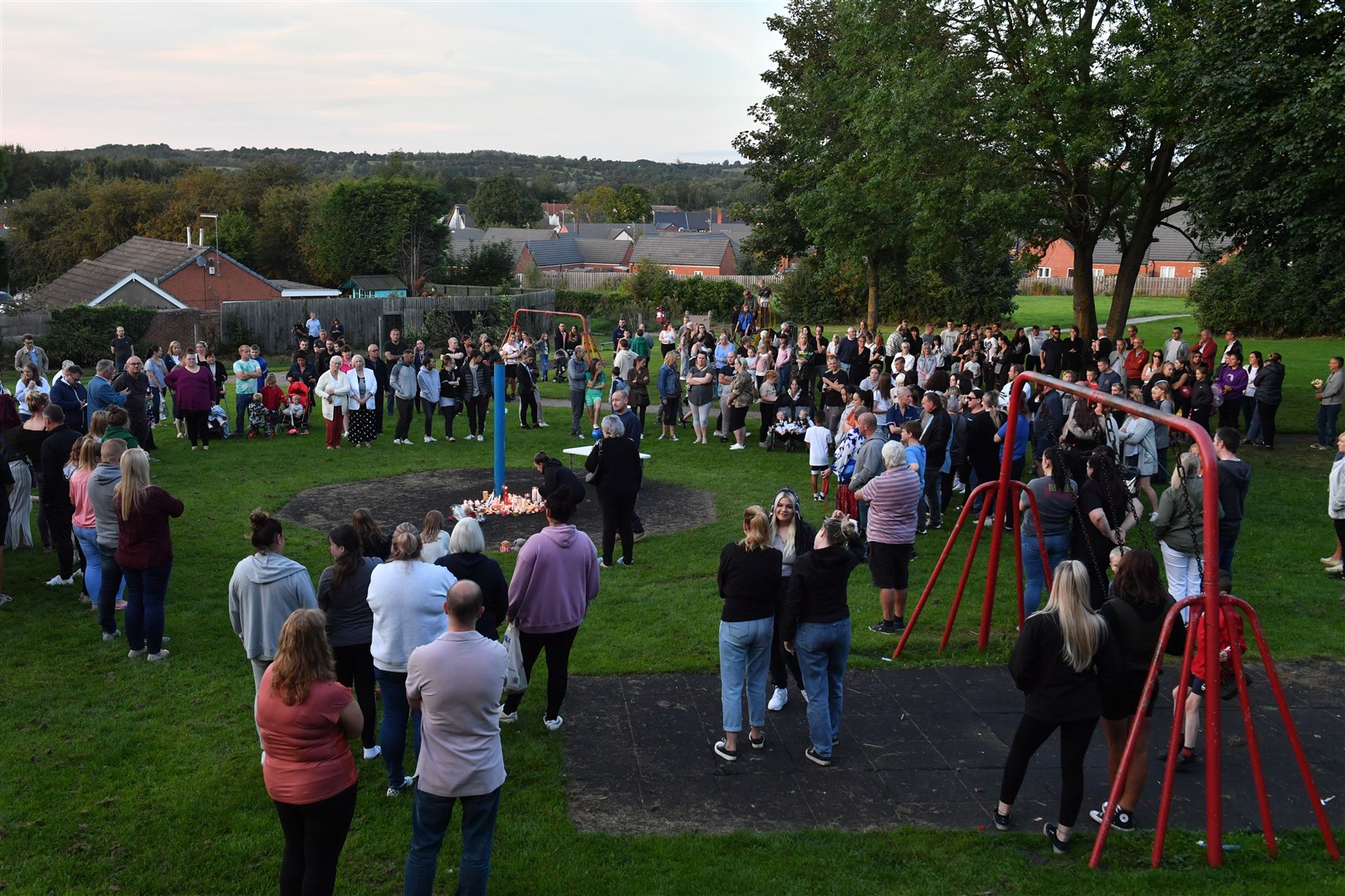 Members of the public attend a vigil near to the scene in Chandos Crescent, Killamarsh (Anthony Devlin/PA)