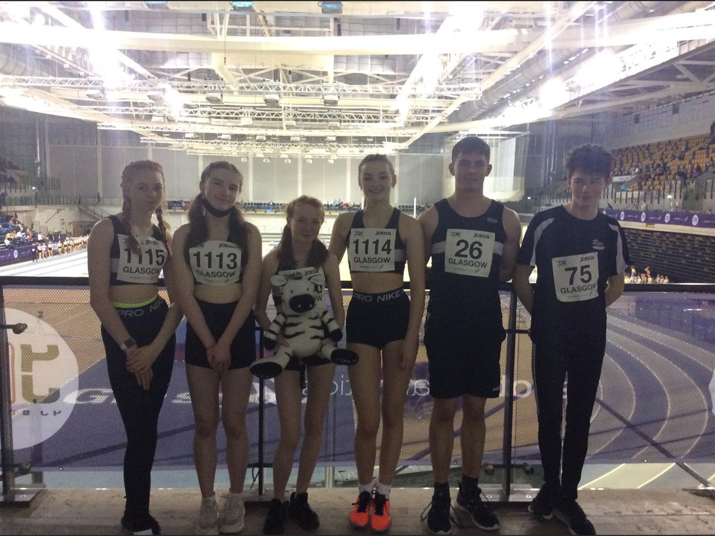 The Elgin AAC relay team with heptathletes Dean Murdoch and Tom Palmer.