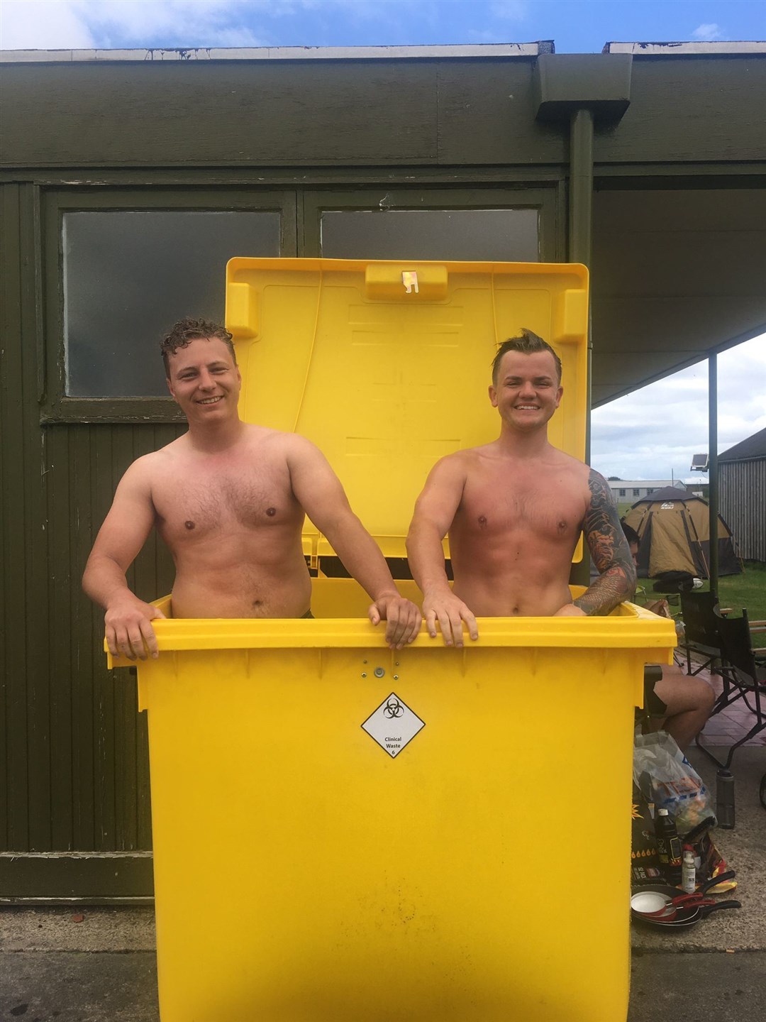 it's ice bath time for two of the RAF Lossiemouth Owls team to ease aching muscles.