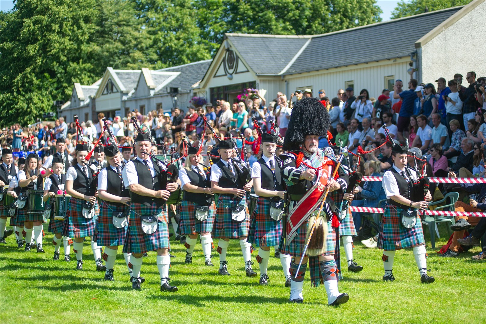 The Strathisla Pipe Band take to the field at the Aberlour Highland Games...The 76th Aberlour Stathspey Highland Games - 3rd August 2019. ..Picture: Daniel Forsyth. Image No.044579.