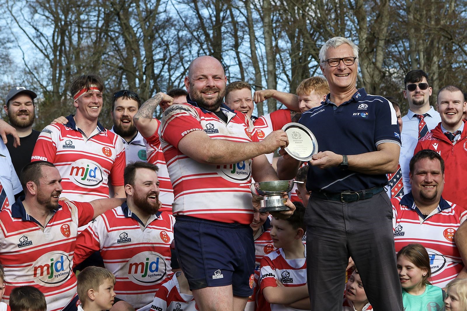 Captain Marc Higgins being presented with trophy and plate to retain. Picture: John MacGregor