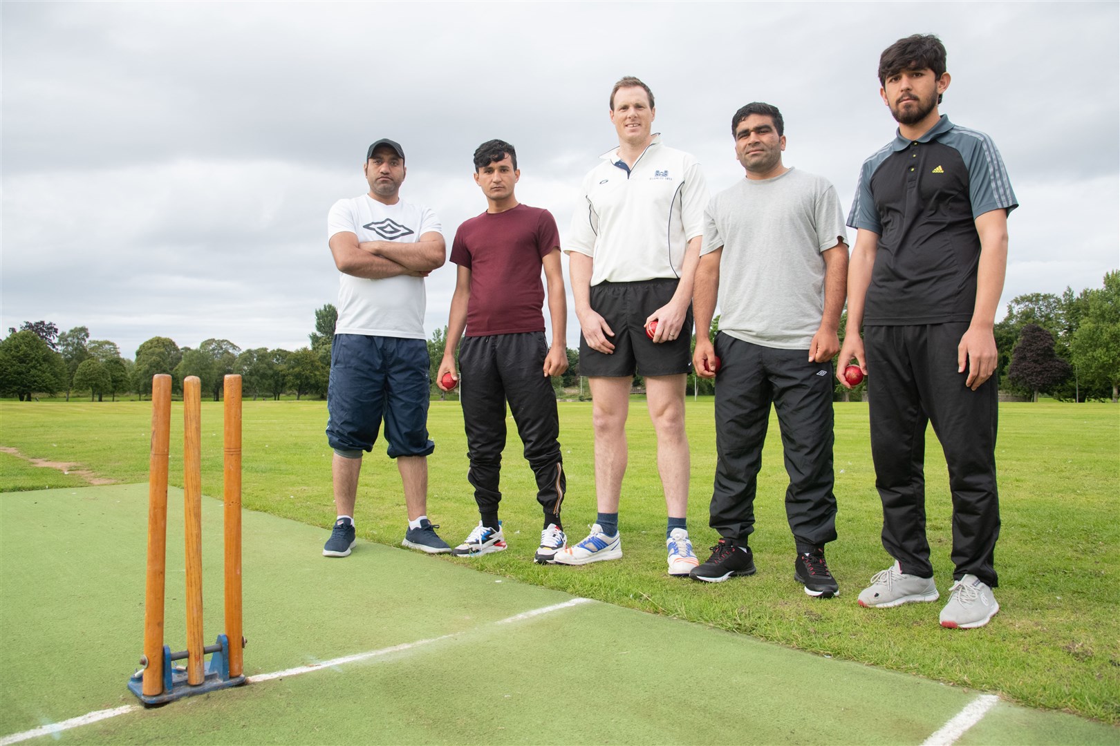 From left are: Quadrat Tullah Sultani; Abdulbasir Mangwal; Robin Quilliam; Shirin Agha and Rapiullah Admadze... Elgin Cricket Club have welcomed a handful of Afghan refugees and asylum seekers to the club. Picture: Daniel Forsyth