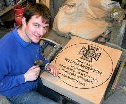 John Ross works on the memorial for William Anderson
