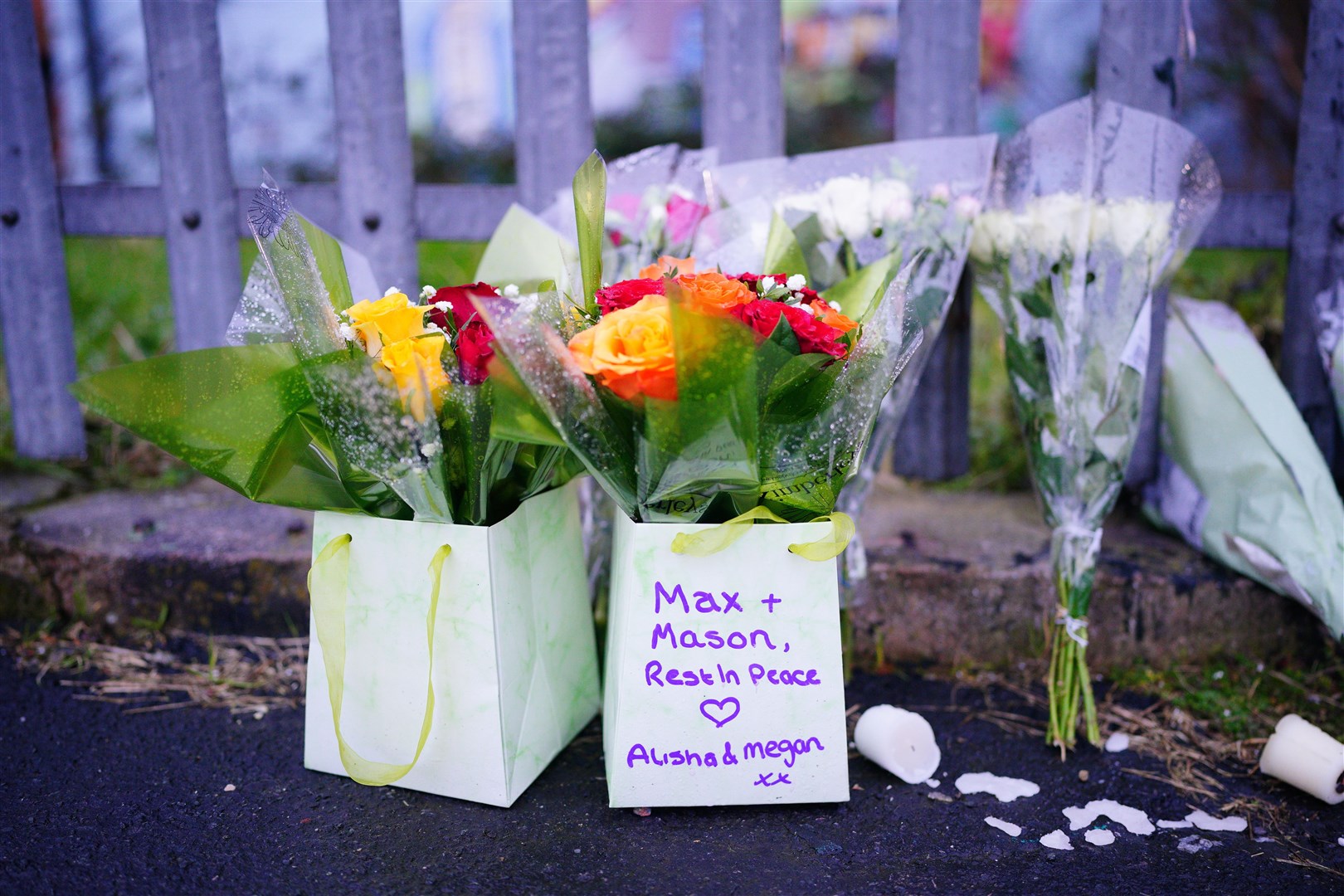 People have been leaving tributes at the scene (Ben Birchall/PA)