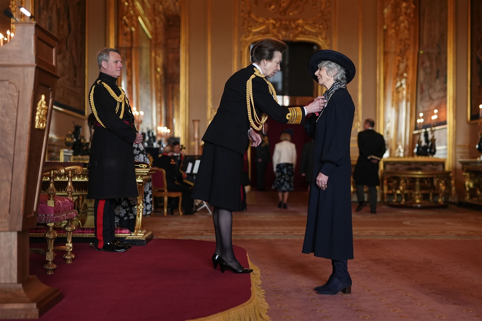 Diana Parkes is made a CBE by the Princess Royal at Windsor Castle (Aaron Chown/PA)