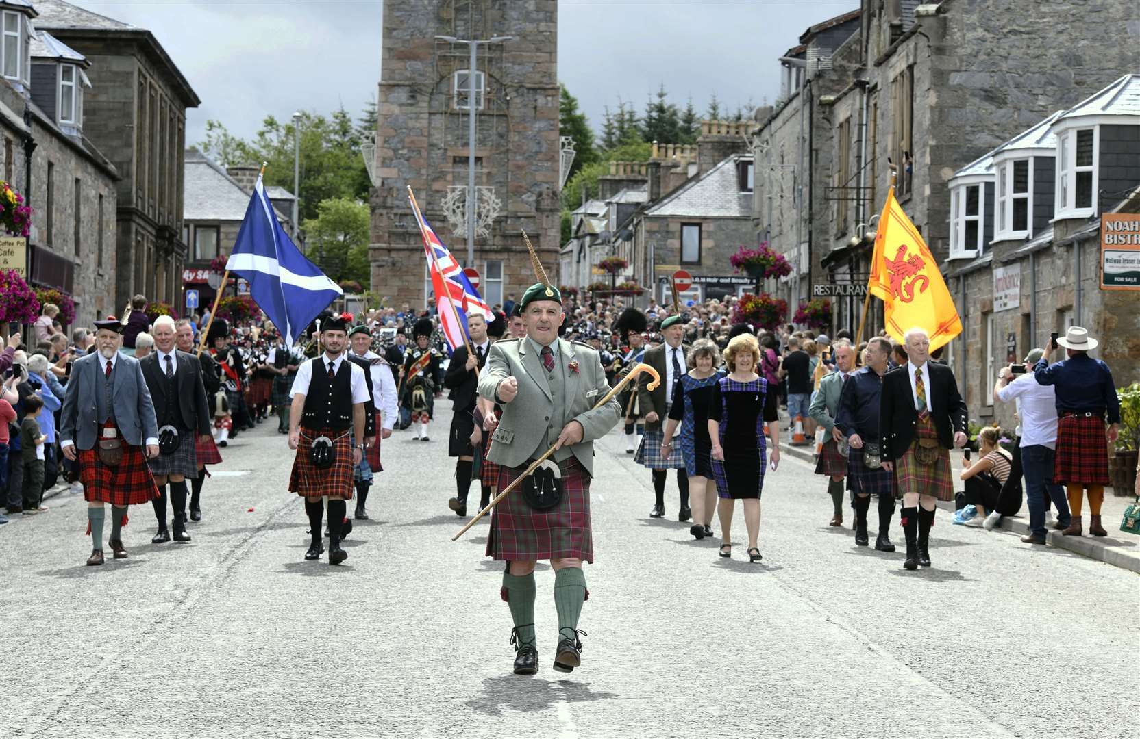 The chieftain, Alex Grant, leading the parade to start the Dufftown Highland Games. Picture: Beth Taylor.
